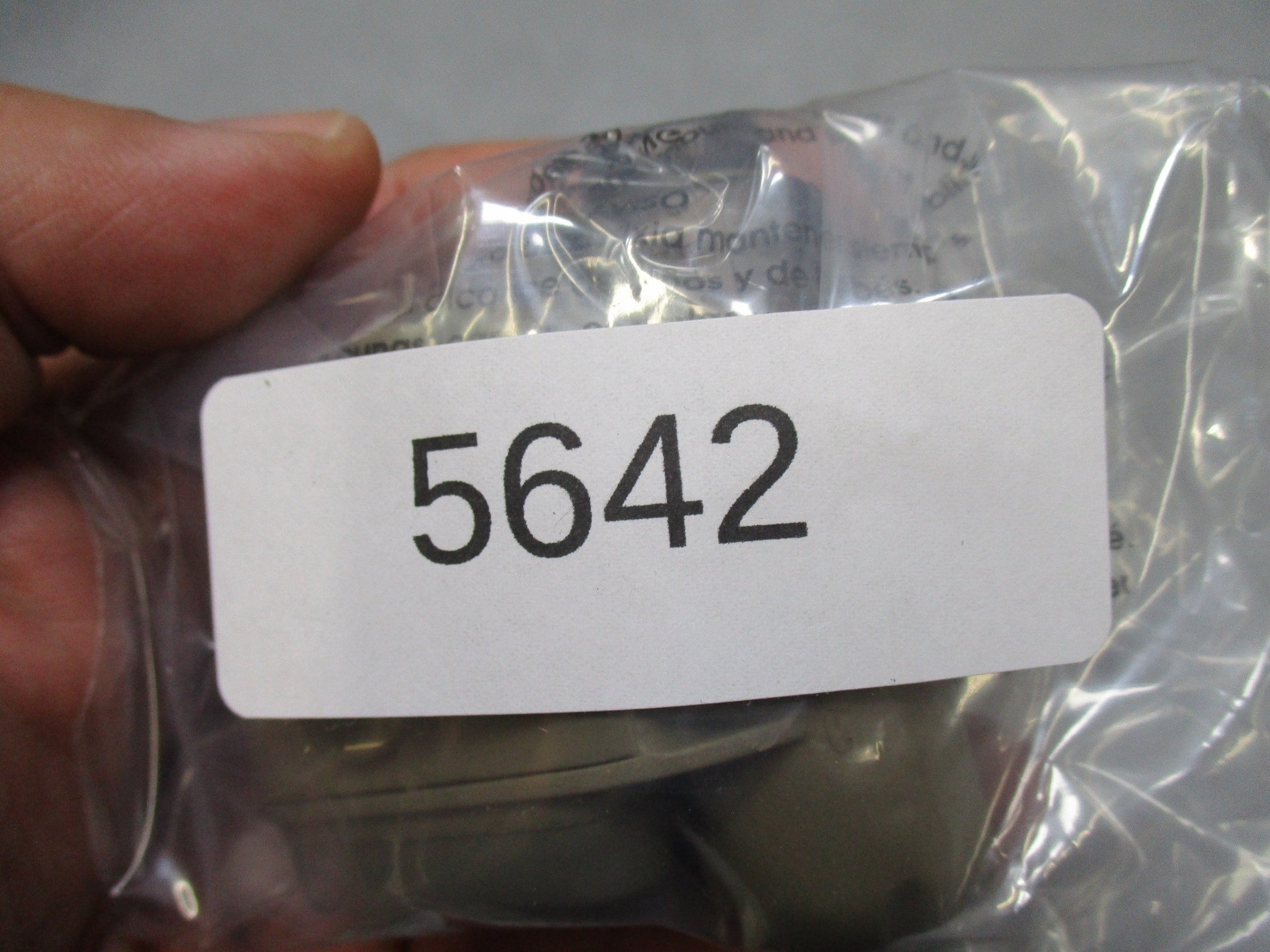 Army tan SureFire helmet light with white/blue LEDs, IR strobe, mounted on ACH/MICH helmet, used by Centex Military Gear.