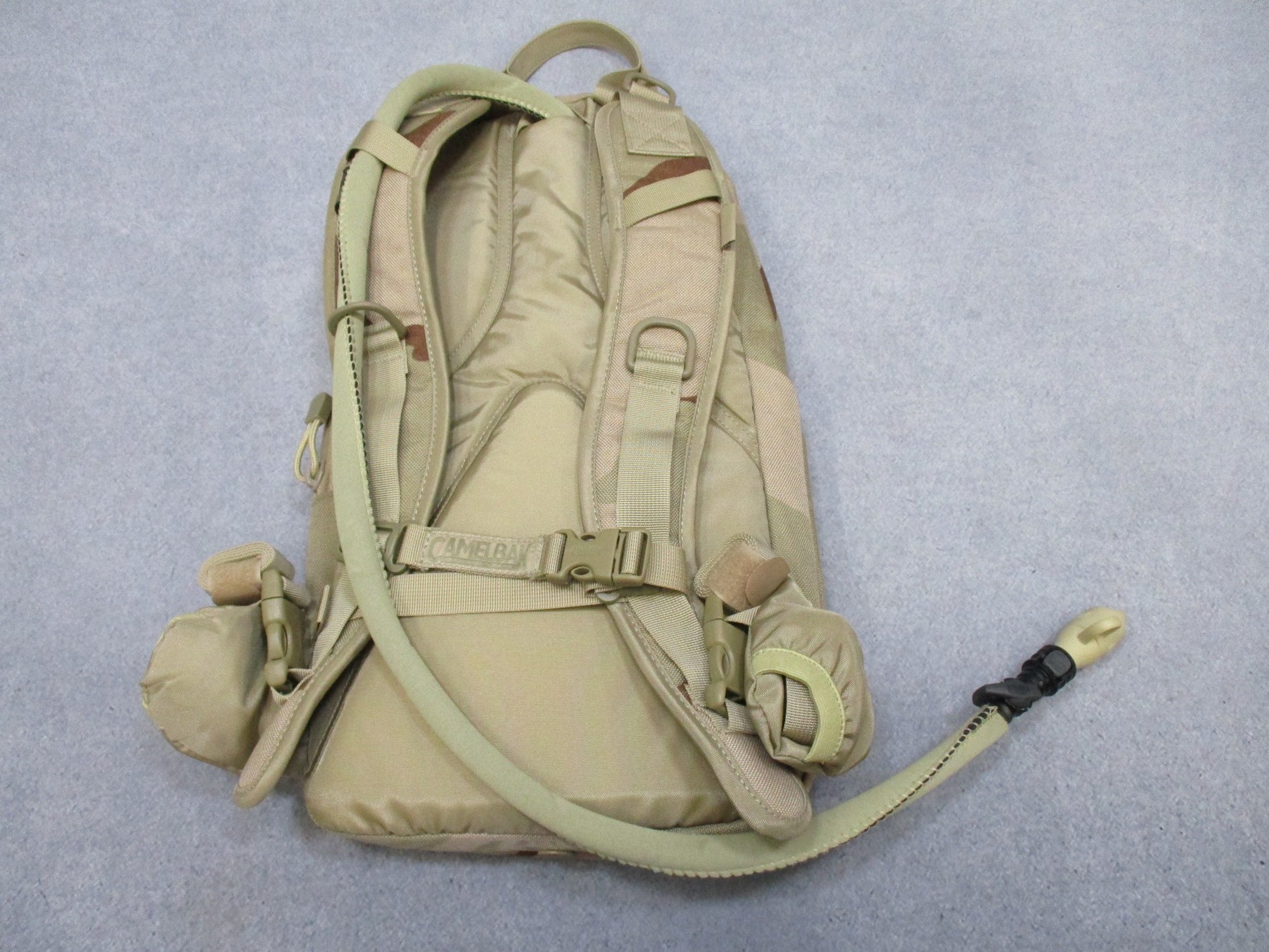 CamelBak MULE hydration pack in desert tan with tactical design and hydration reservoir, from Centex Military Gear.