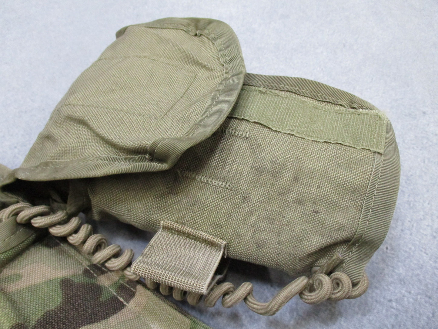 Centex Military Gear USGI Multicam IFAK pouch containing expired medical supplies for military first aid preparedness.