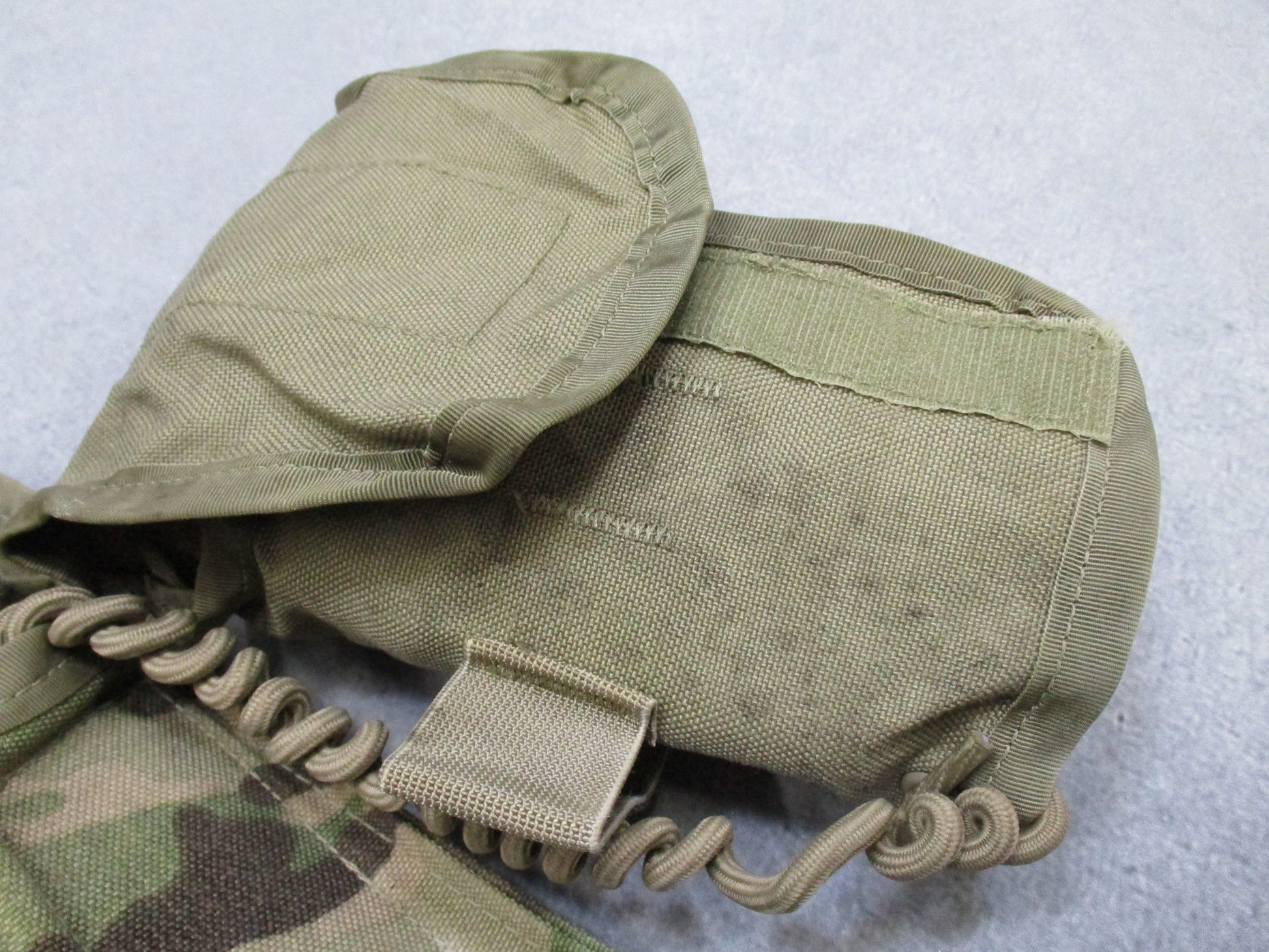 Centex Military Gear USGI Multicam IFAK pouch containing expired medical supplies for military first aid preparedness.
