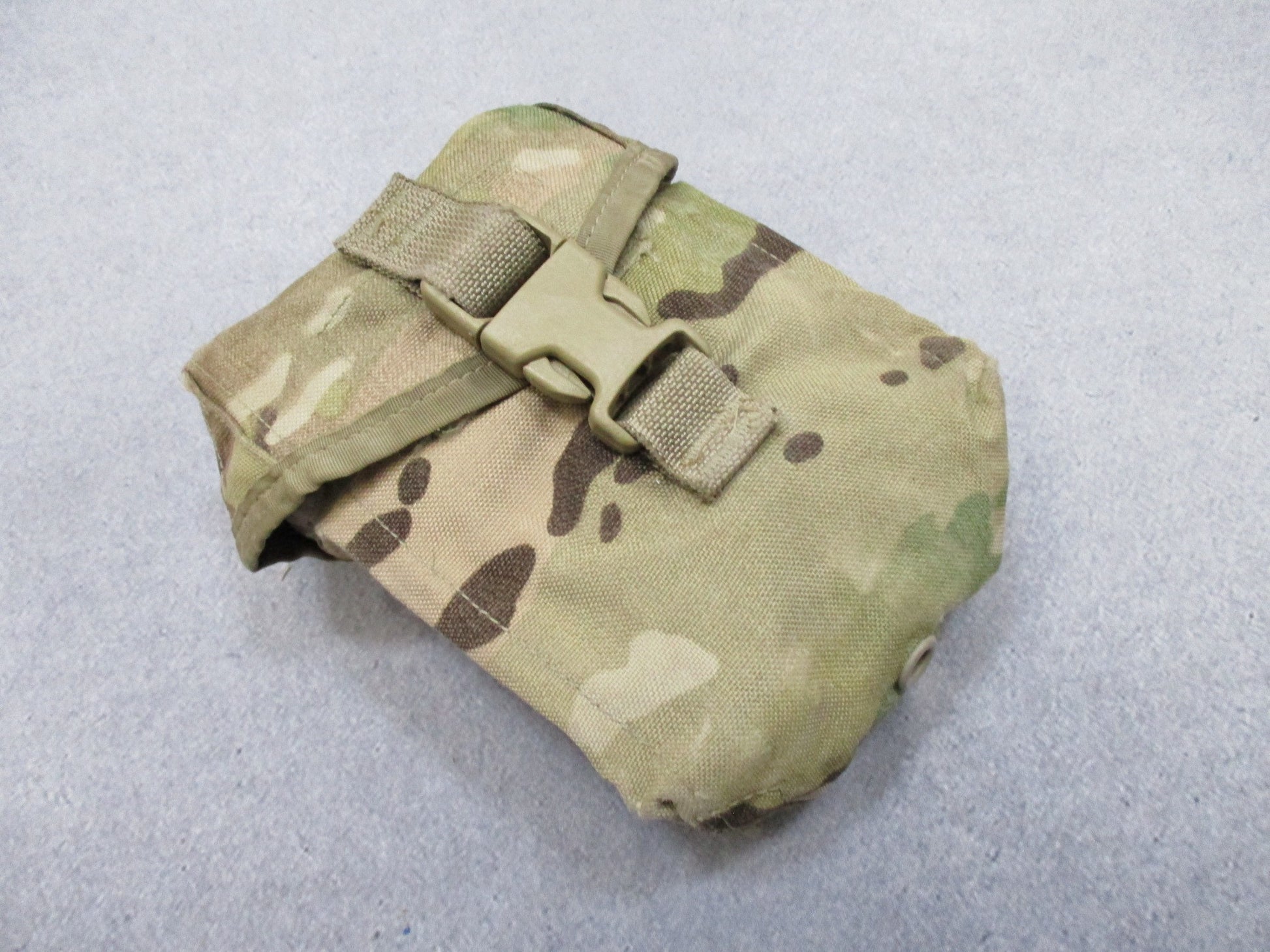 USGI Multicam IFAK pouch with expired medical contents, military-style first aid kit from Centex Military Gear.