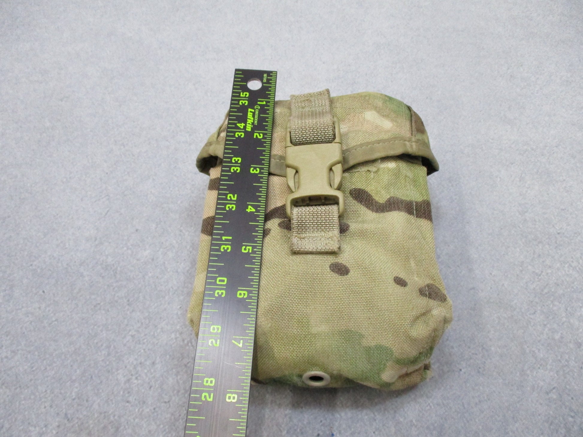 USGI Multicam IFAK pouch by Centex Military Gear with expired medical supplies, military-style first aid kit in camouflage design.