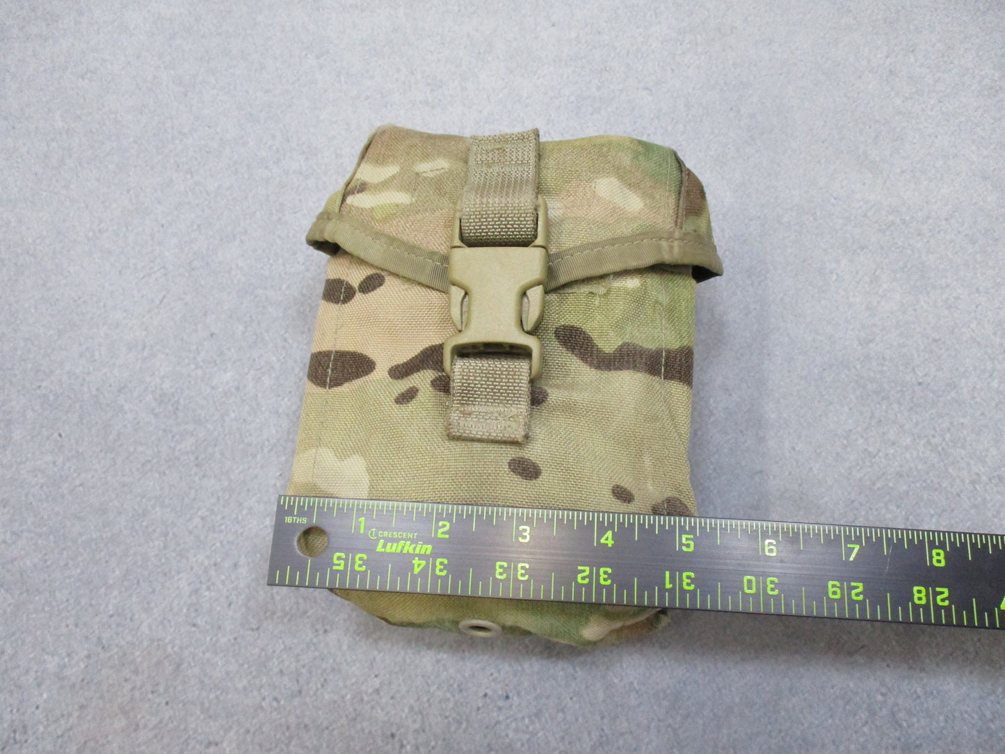 USGI Multicam IFAK pouch by Centex Military Gear with expired medical supplies for military first aid preparedness.
