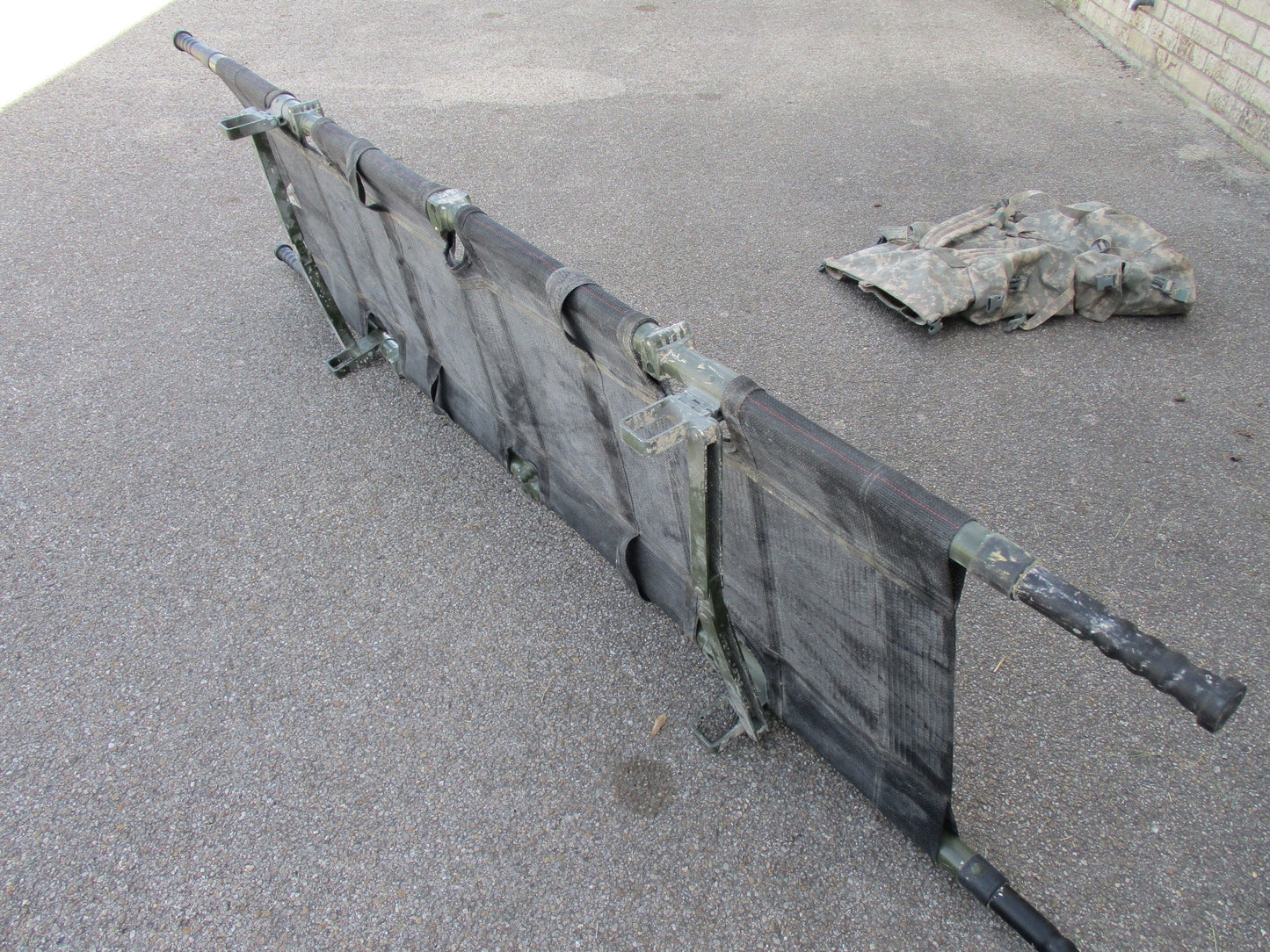 Centex Military Gear NAR Talon II 90C Army litter with carry bag, foldable ACU medical stretcher, used for emergency medical transport.