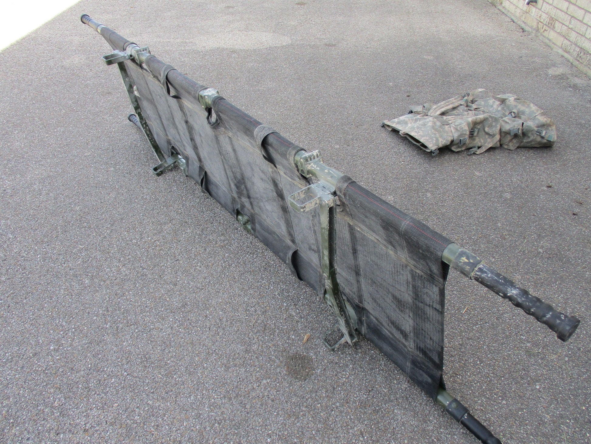 Centex Military Gear NAR Talon II 90C Army litter with carry bag, foldable ACU medical stretcher, used for emergency medical transport.