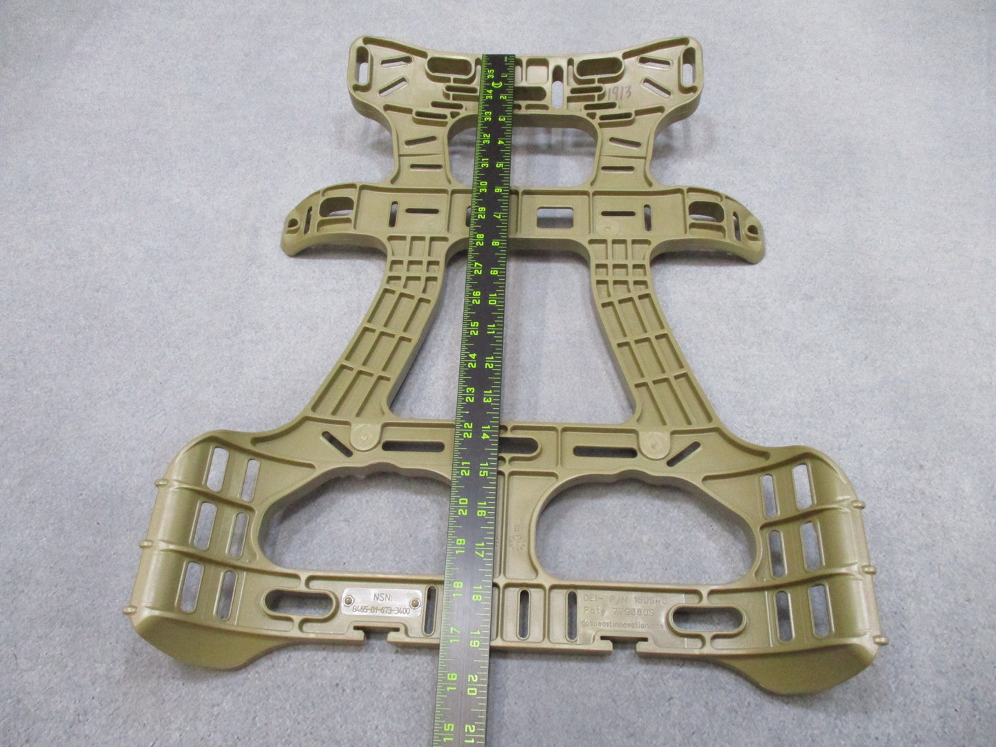 USGI MOLLE 4K Main Pack Frame in tan with external frame and MOLLE attachment points, designed for military load-bearing.