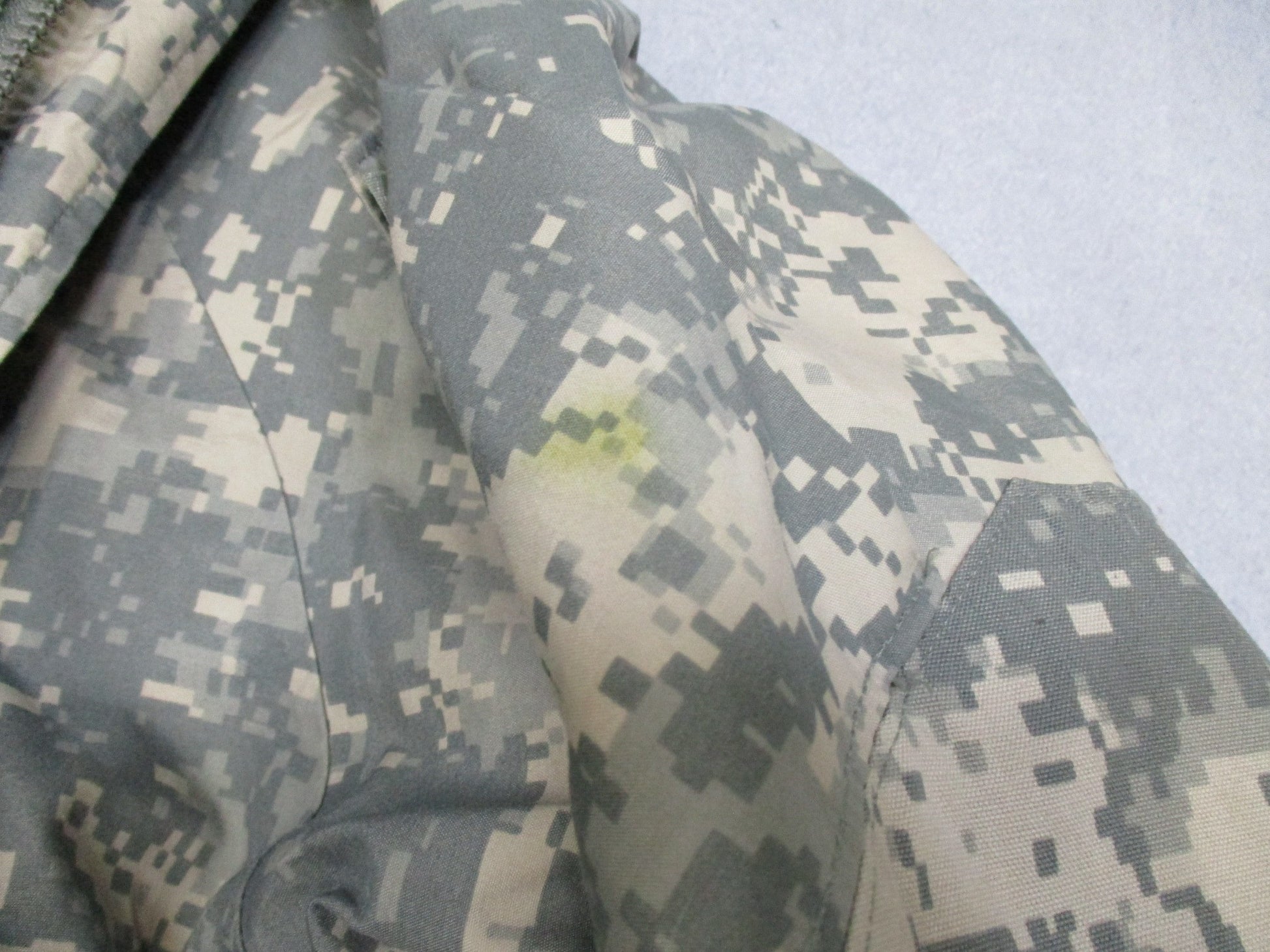 USGI Army ACU digital cold and wet weather GORE-TEX jacket in large/regular size, made by Centex Military Gear.