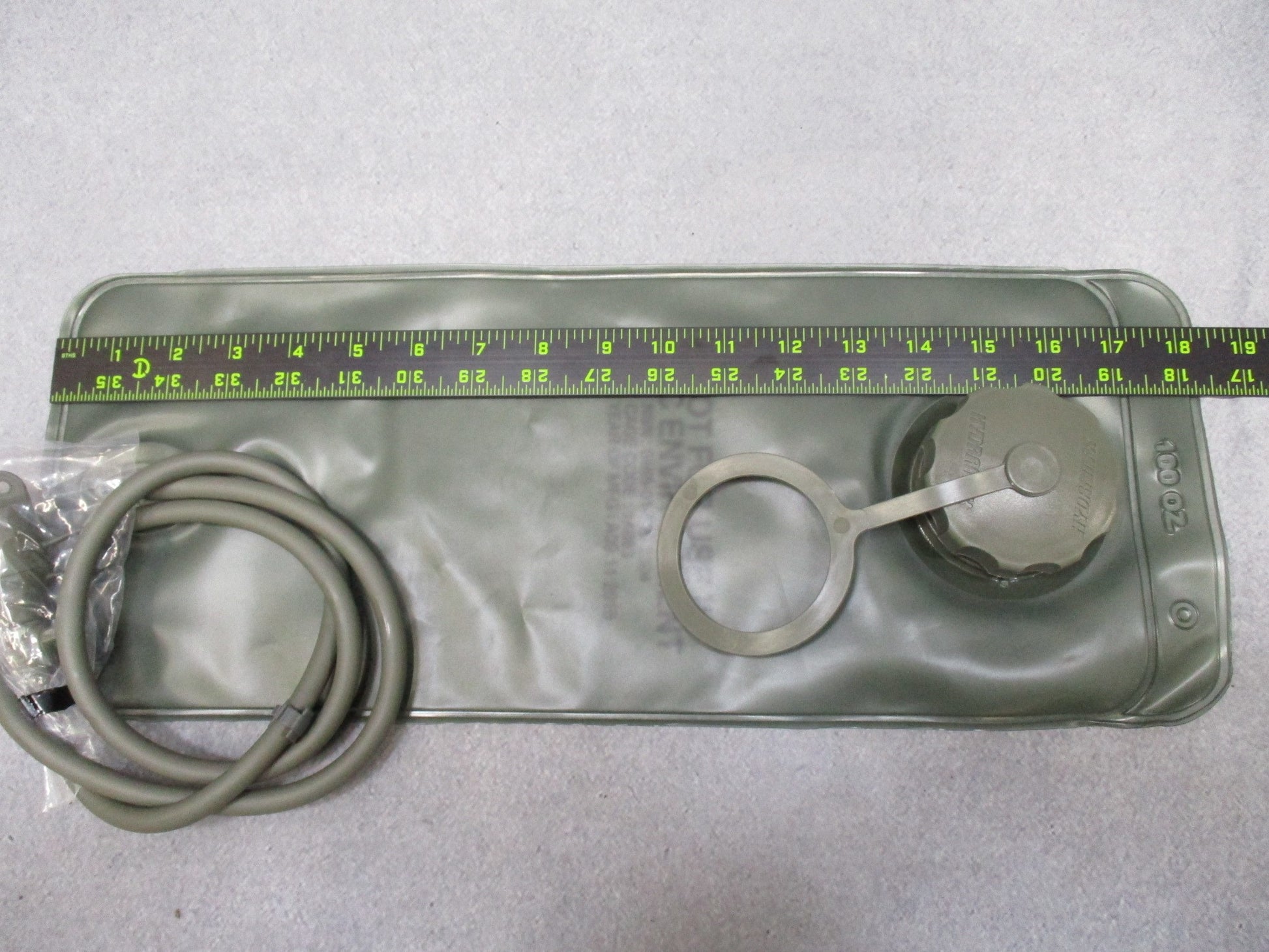 Foliage green USGI MOLLE II 3L hydration bladder by Centex Military Gear with water reservoir and quick-release hose.