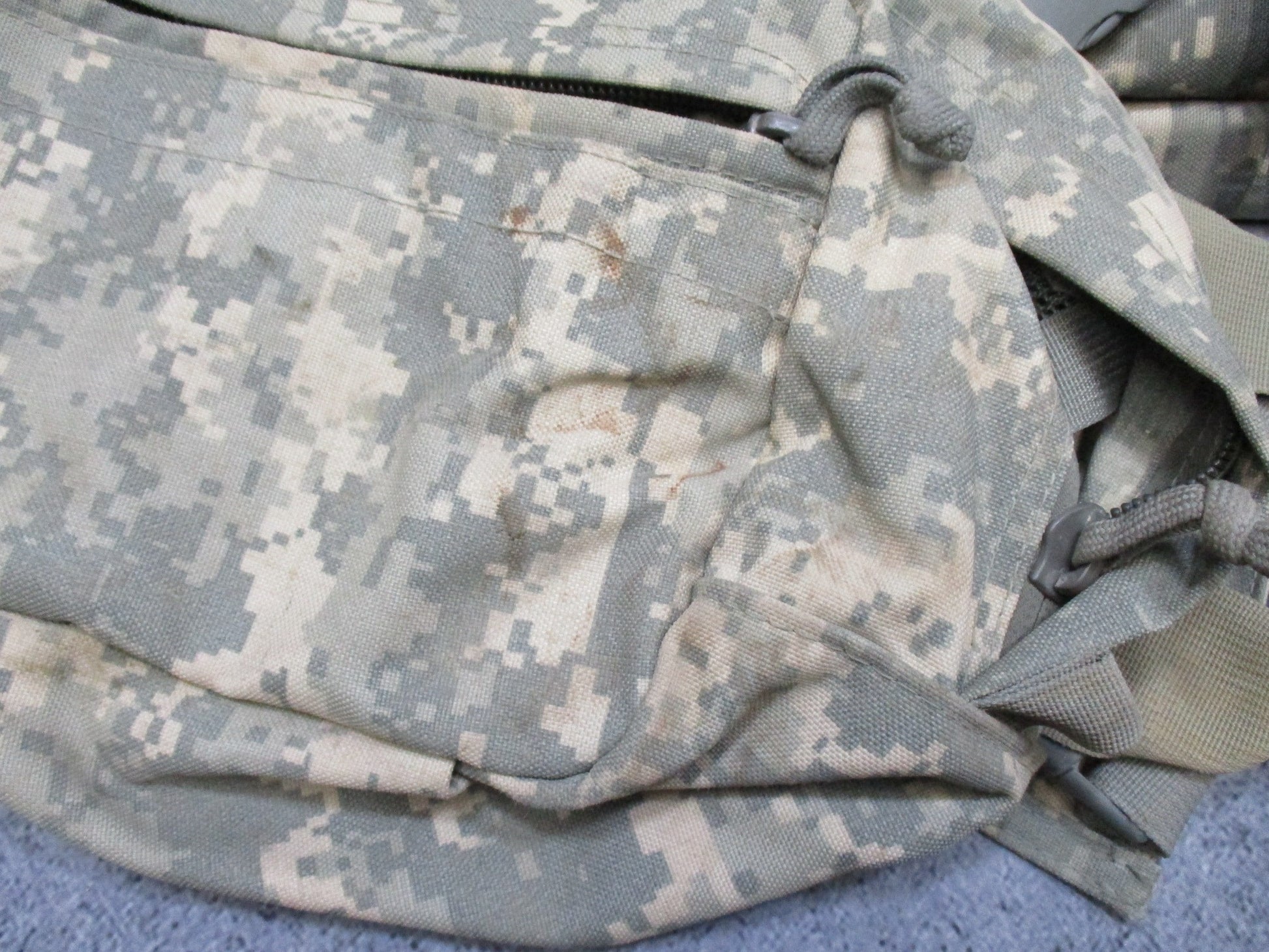 Empty USGI CLS medical bag in ACU digital camouflage with Centex Military Gear branding, designed for army combat lifesaver use.
