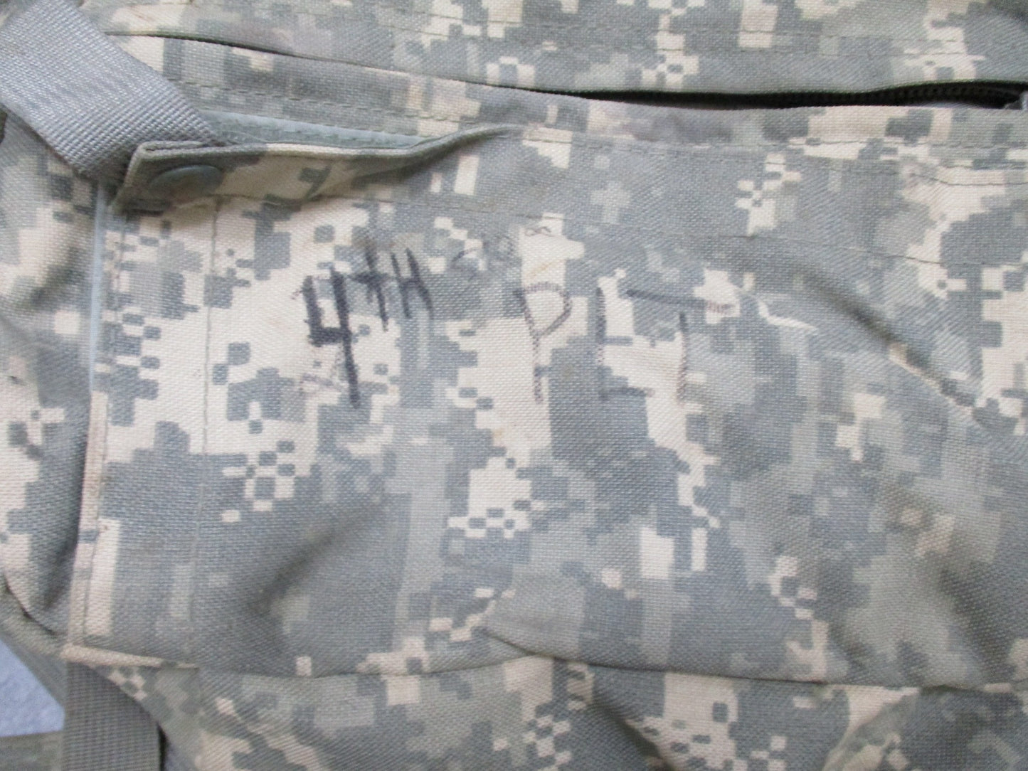 Empty USGI CLS medical bag in ACU Digital camouflage with Centex Military Gear branding, designed for army combat lifesaver use.