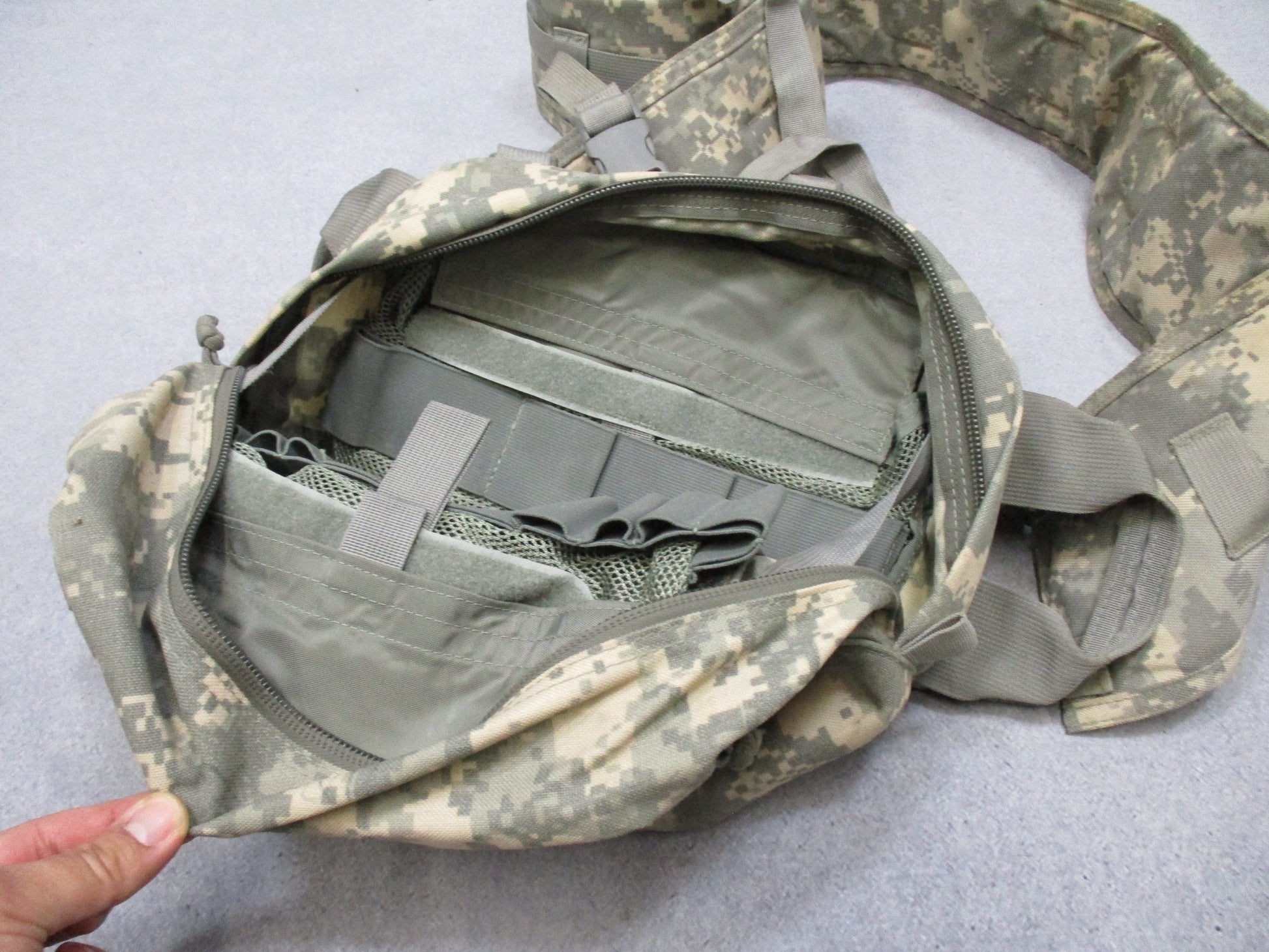 Empty USGI CLS medical bag in ACU Digital camouflage with Centex Military Gear branding, designed for army combat lifesaver use.