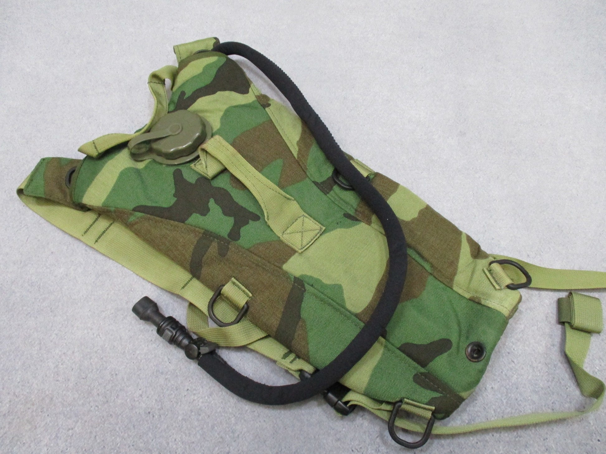 Centex Military Gear Camelbak 3L Woodland BDU hydration pack with adjustable straps and multiple compartments for outdoor use.