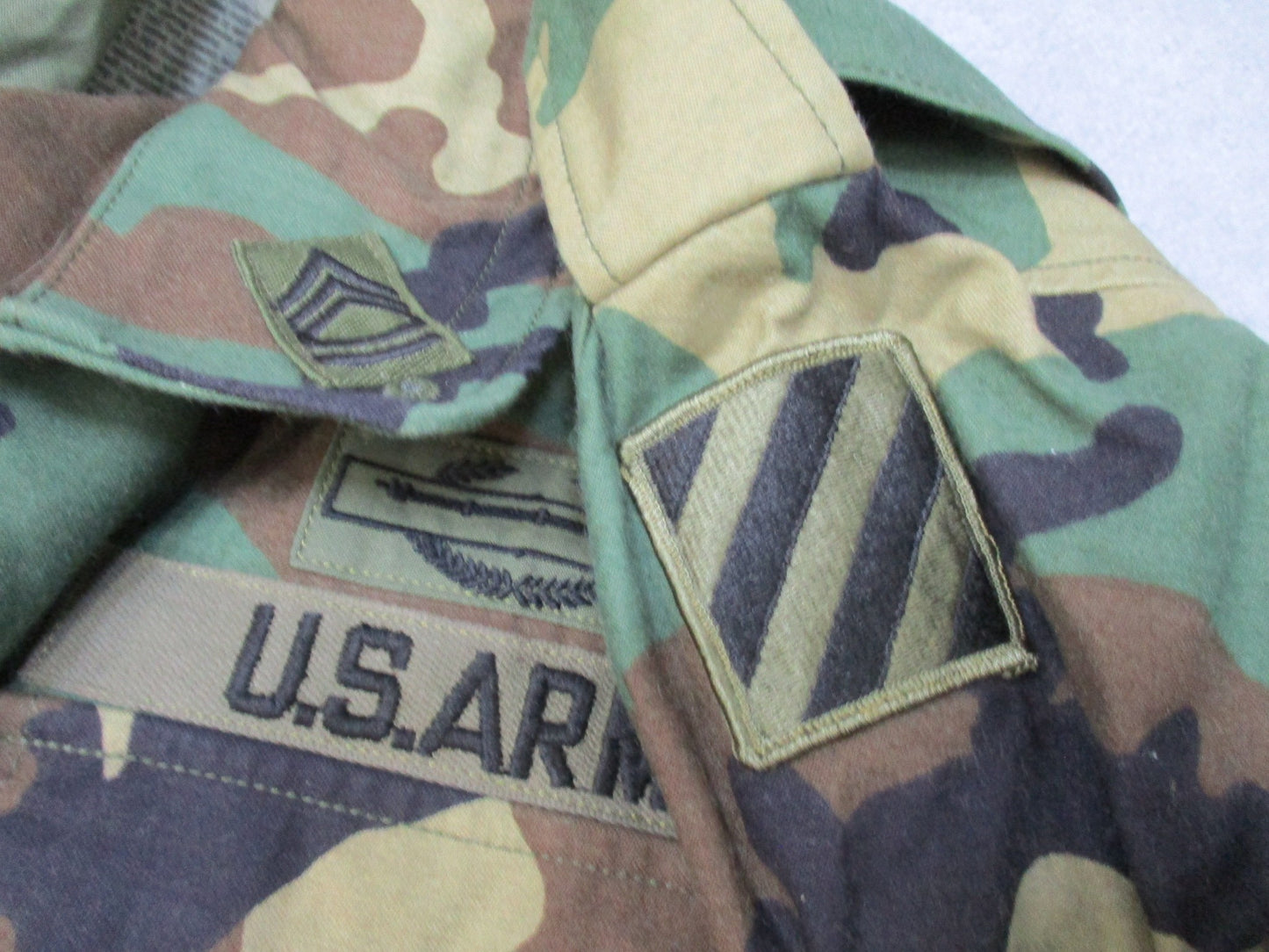 USGI M65 Field Jacket Woodland camouflage in large regular size, military-style cold weather coat with patches by Centex Military Gear