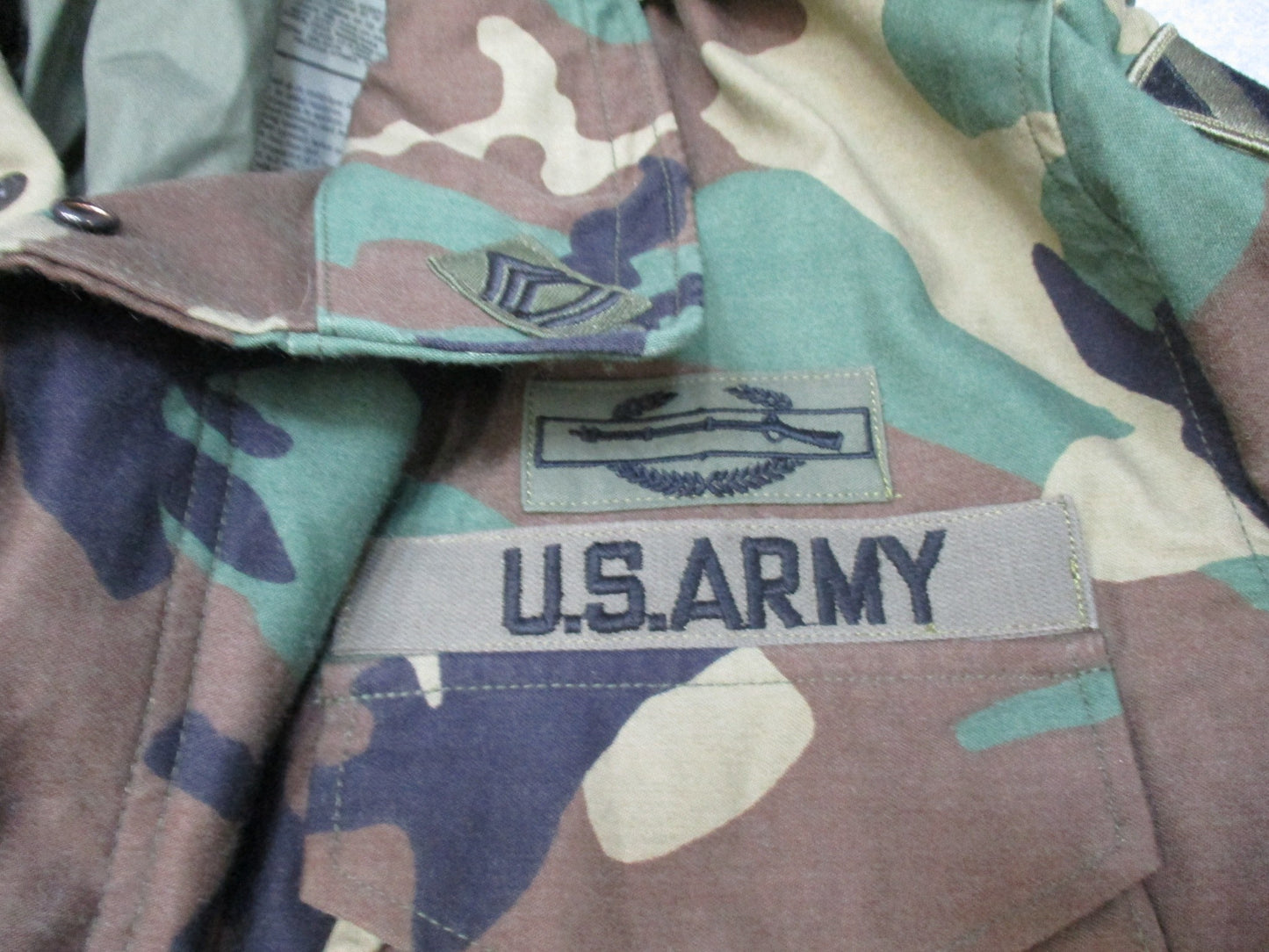 USGI M65 Field Jacket Woodland in large regular size, cold weather military coat with patches, by Centex Military Gear.
