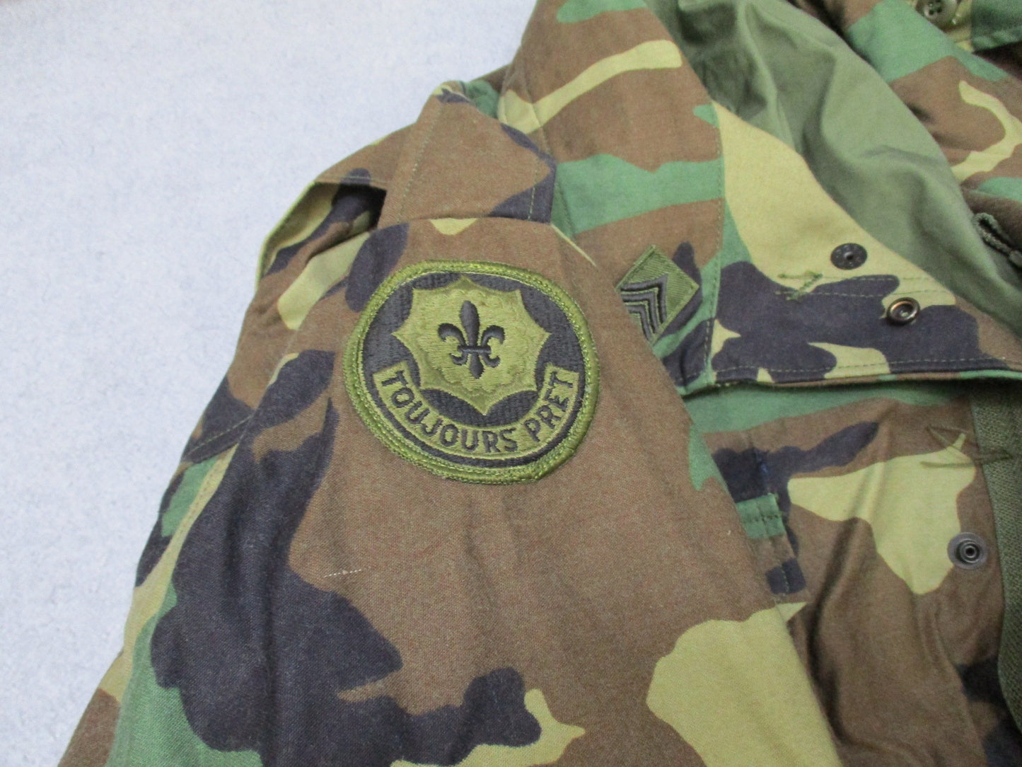 USGI M65 Field Jacket Woodland in Large Regular size with patches, a cold weather military coat by Centex Military Gear.