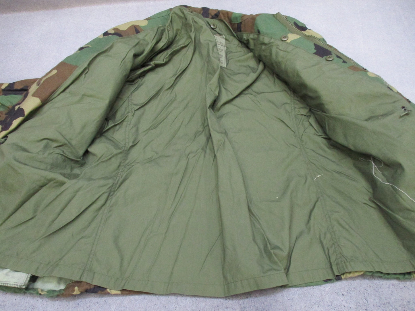 USGI M65 Field Jacket Woodland in large regular size with patches, designed for cold weather military-style coat by Centex Military Gear