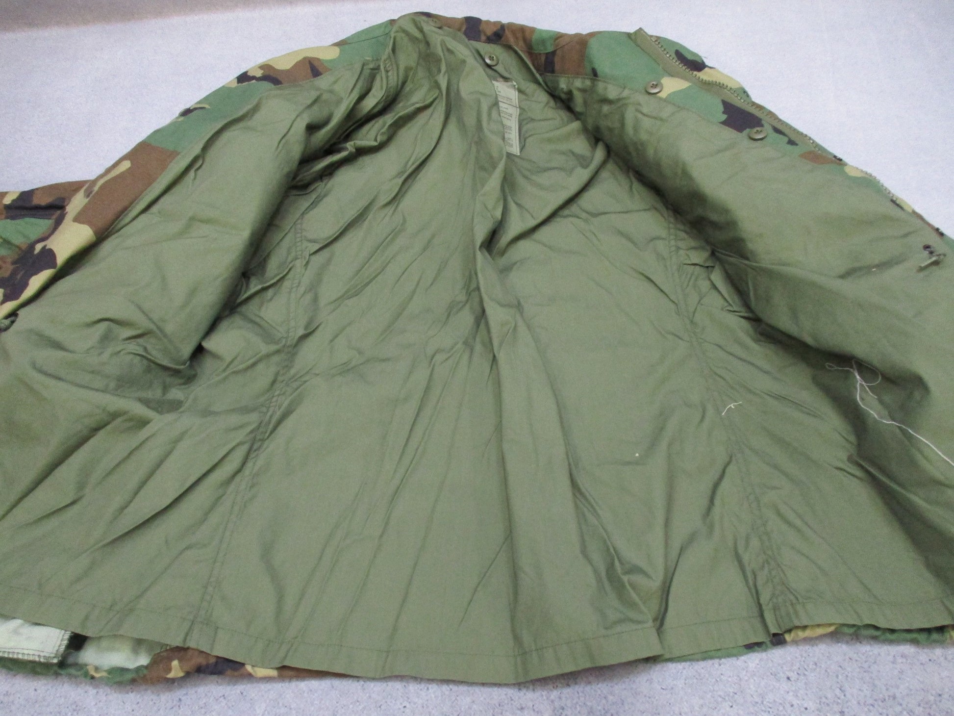 USGI M65 Field Jacket Woodland in large regular size with patches, designed for cold weather military-style coat by Centex Military Gear