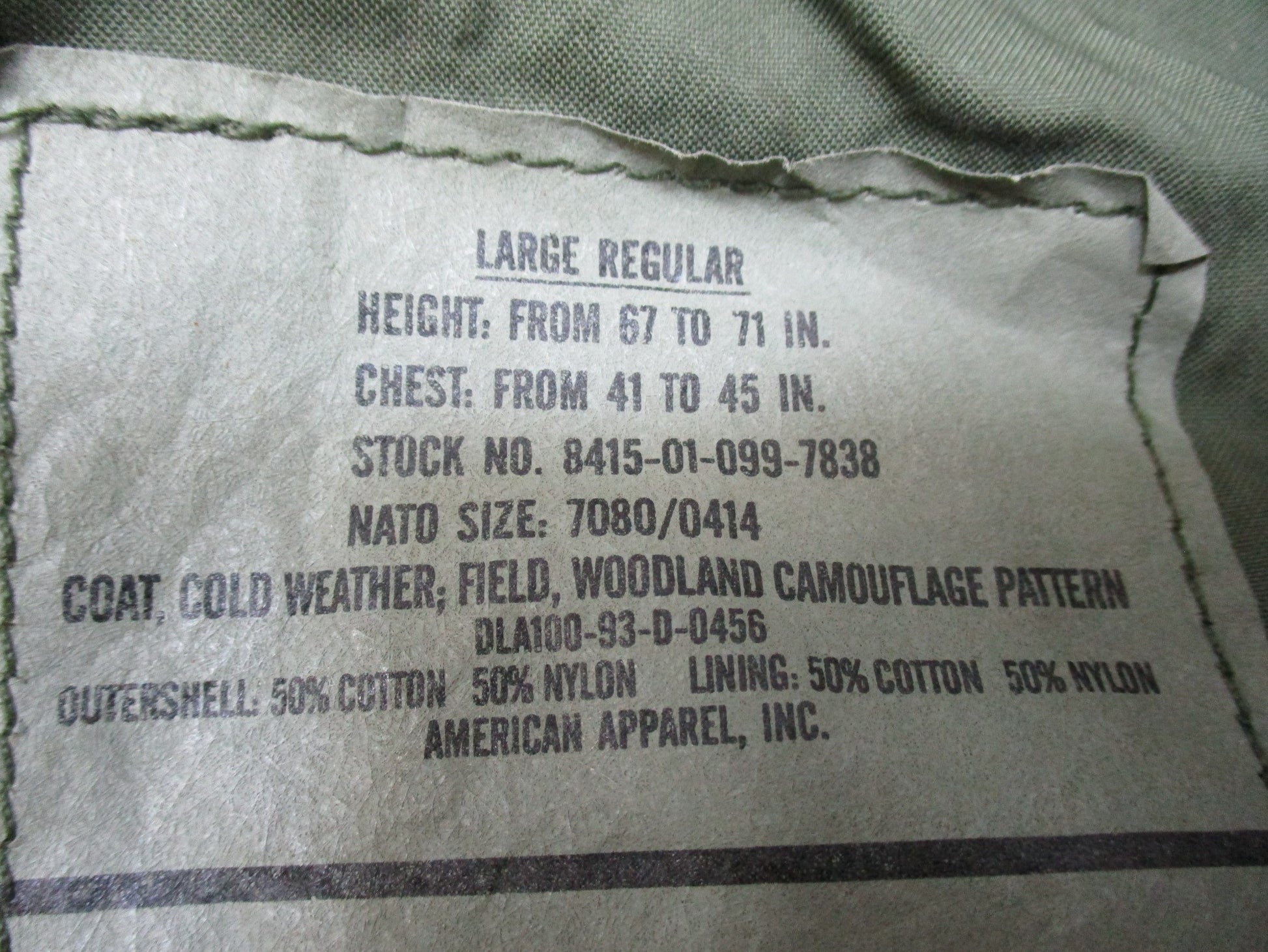 USGI M65 Field Jacket Woodland camouflage in large regular size, cold weather coat with patches, by Centex Military Gear.