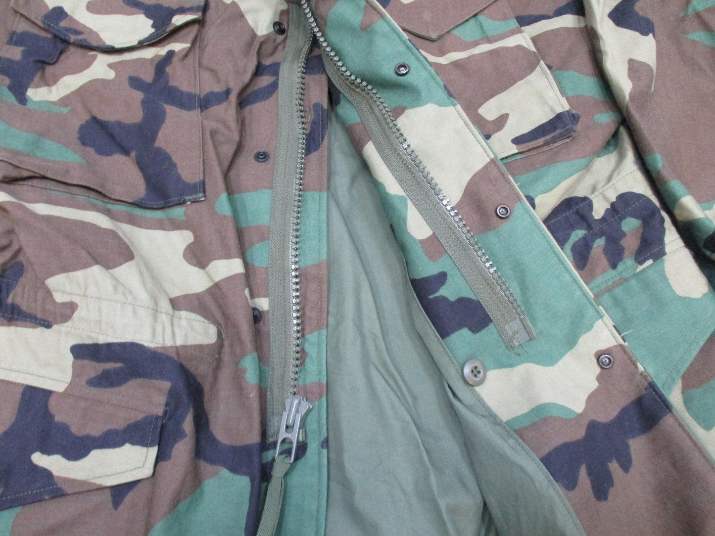 USGI M65 Field Jacket Woodland camouflage in large regular size, Cold Weather Coat with patches, by Centex Military Gear.