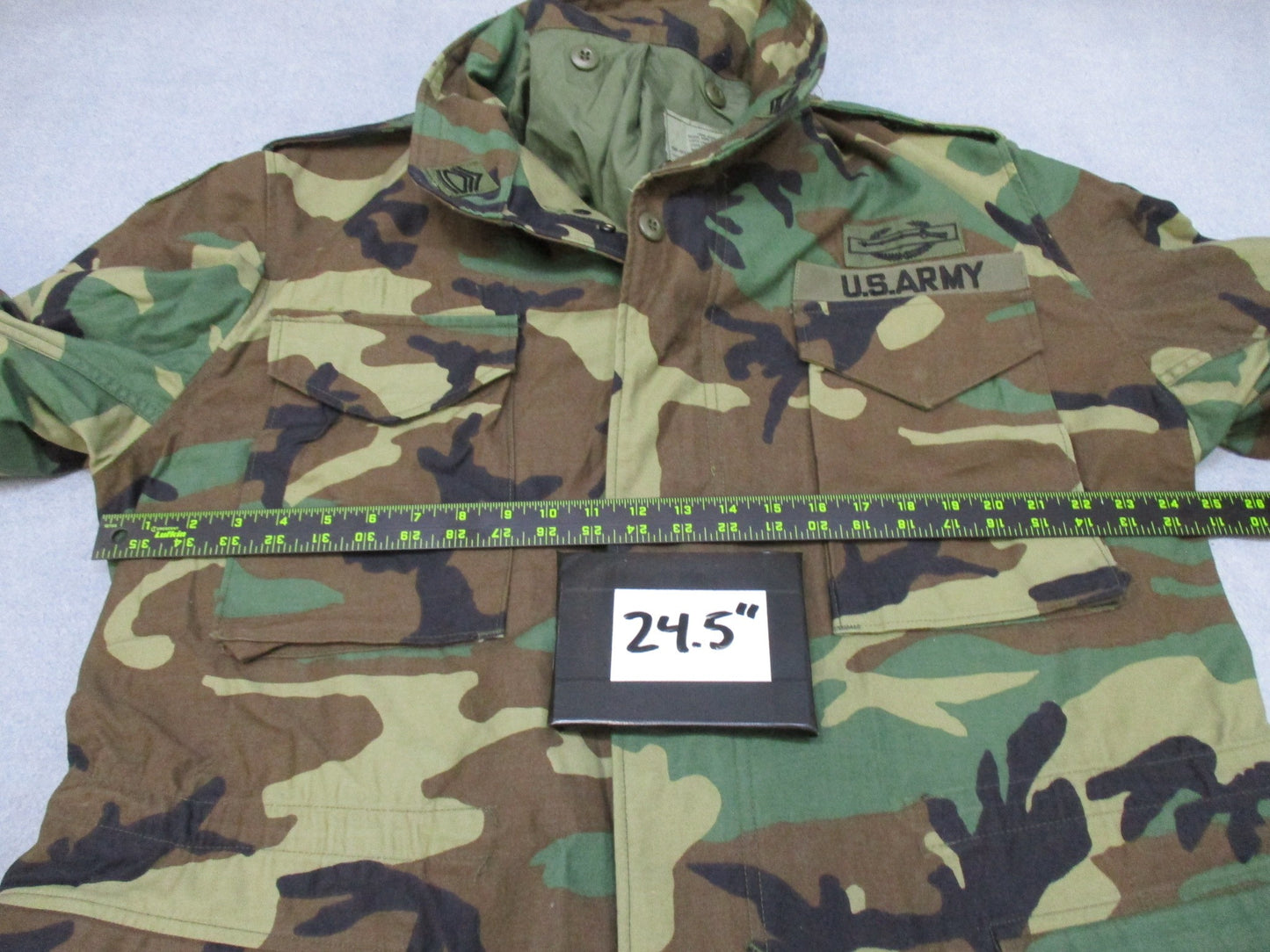 USGI M65 Field Jacket Woodland camouflage, large regular size, military cold weather coat with patches by Centex Military Gear.