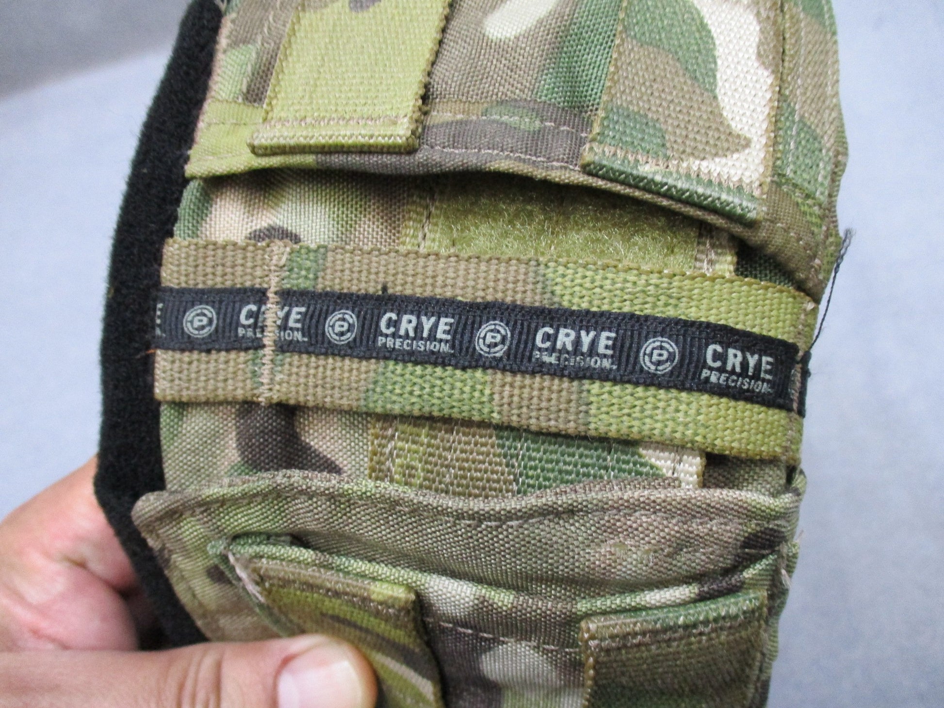 Crye Precision Multicam padded tactical battle belt with MOLLE attachment and small size, designed for military and tactical use.