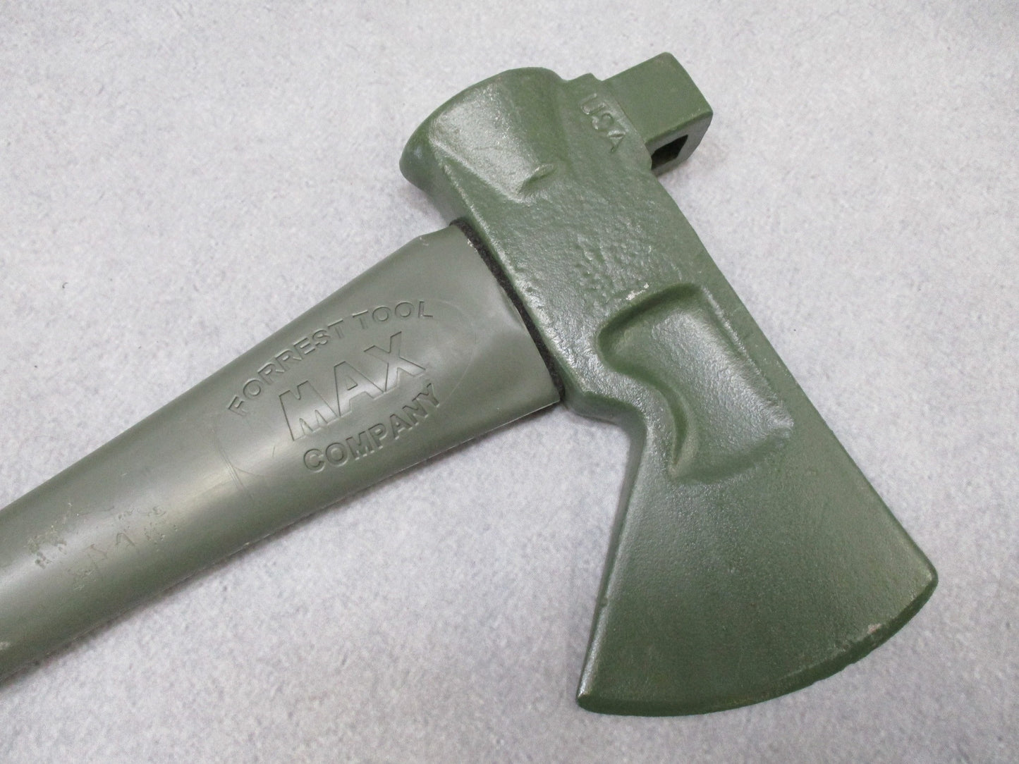 USGI Forest Tool MAX axe with OD green fiberglass handle, 34.5 inches, designed for outdoor and camping use by Centex Military Gear