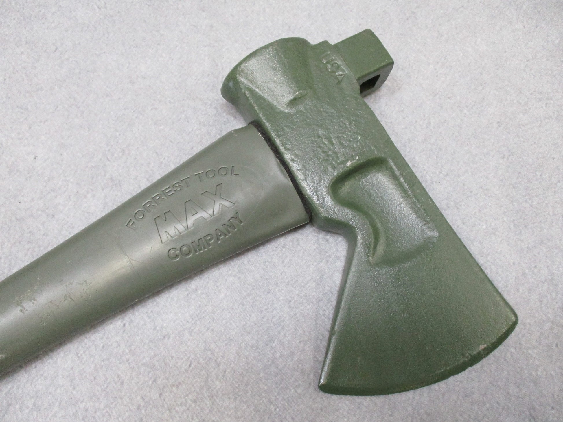 USGI Forest Tool MAX axe with OD green fiberglass handle, 34.5 inches, designed for outdoor and camping use by Centex Military Gear