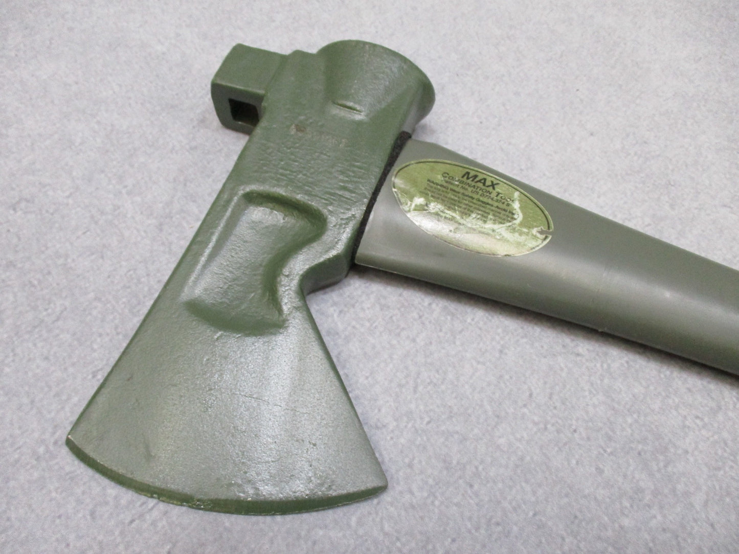 USGI Forest Tool MAX axe with OD green fiberglass handle, 34.5 inches, designed for outdoor and military use by Centex Military Gear