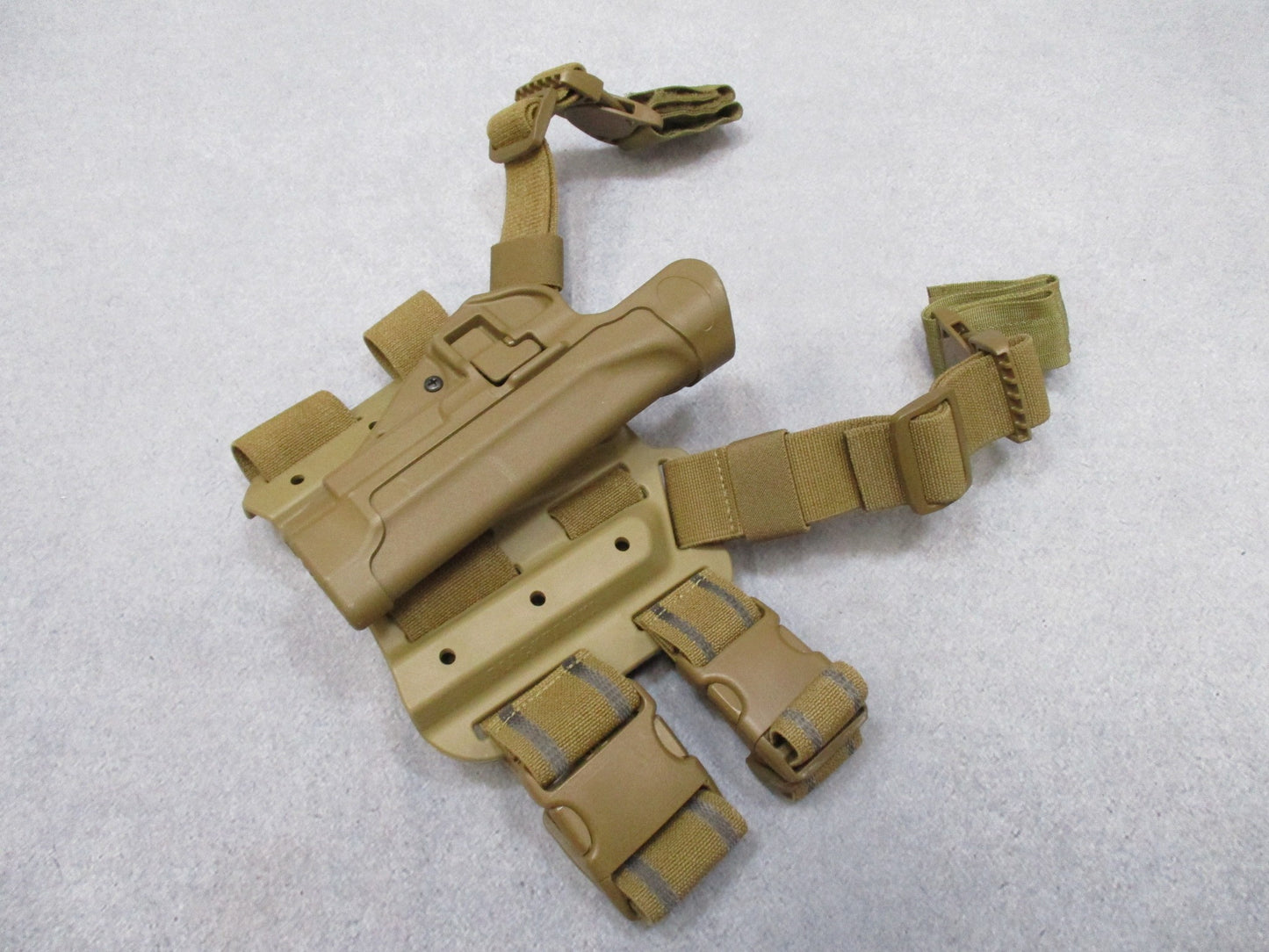 BlackHAWK SERPA CQC thigh holster for Beretta 92/96, tactical Coyote Tan, designed for right-hand carry, by Centex Military Gear.