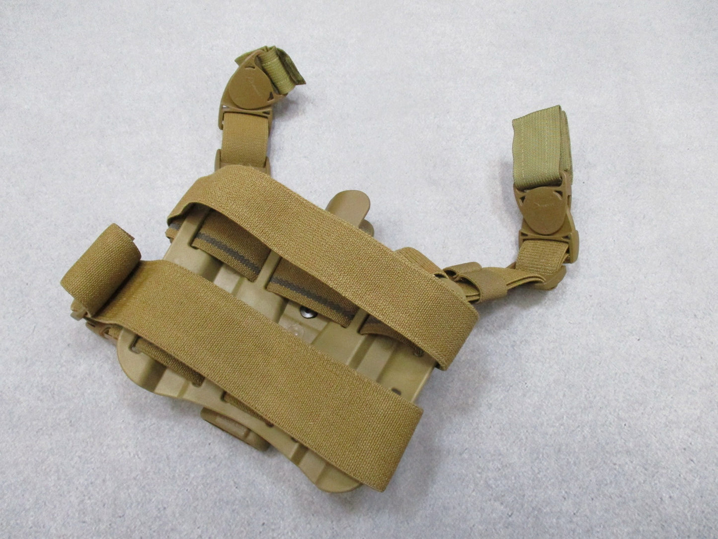 Blackhawk SERPA CQC thigh holster for Beretta 92/96, tactical Coyote Tan, designed for right-handed use, by Centex Military Gear.