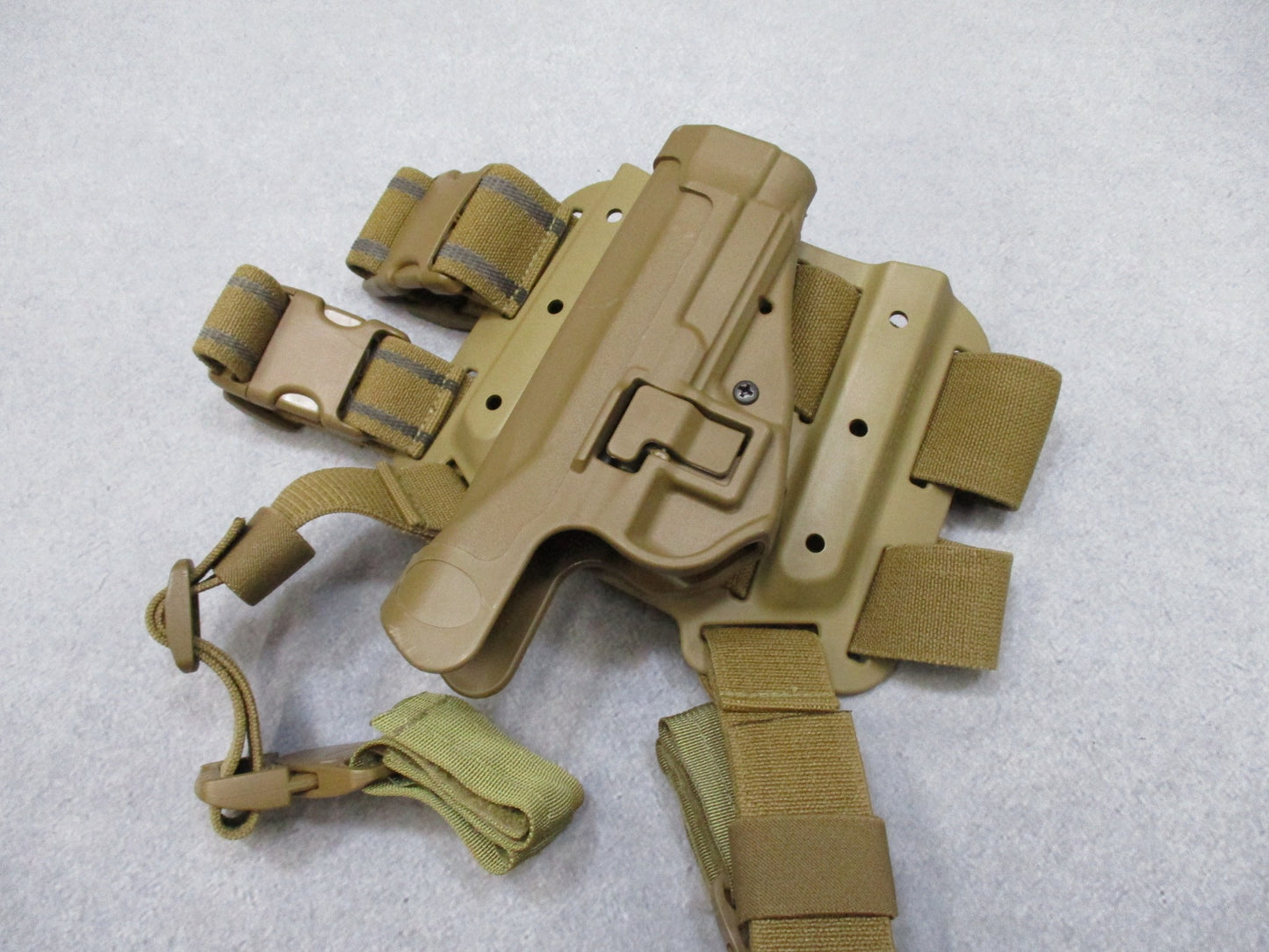 BlackHAWK SERPA CQC thigh holster for Beretta 92/96, tactical Coyote Tan, designed for right-handed carry, by Centex Military Gear.