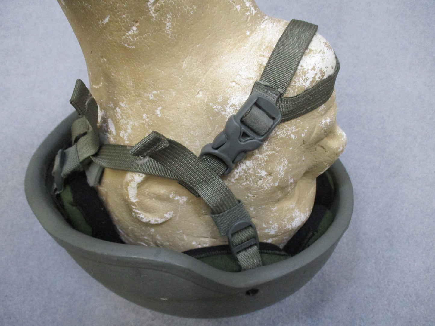 MSA ACH helmet in foliage green with Team Wendy chinstrap and Oregon Aero padded interior, designed for military use.