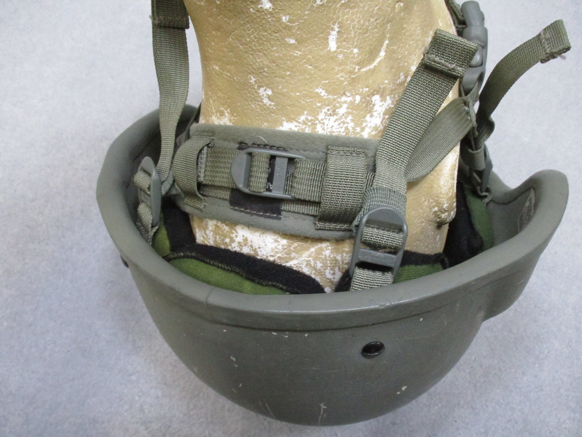 Medium MSA ACH helmet in foliage green with Team Wendy chinstrap and Oregon Aero pads, designed for military and tactical use.