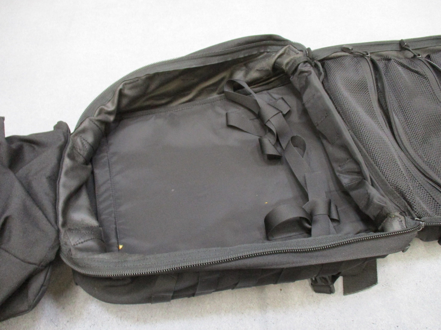 Blackhawk STRIKE medical tactical backpack with MOLLE system in black, featuring multiple compartments and adjustable straps.