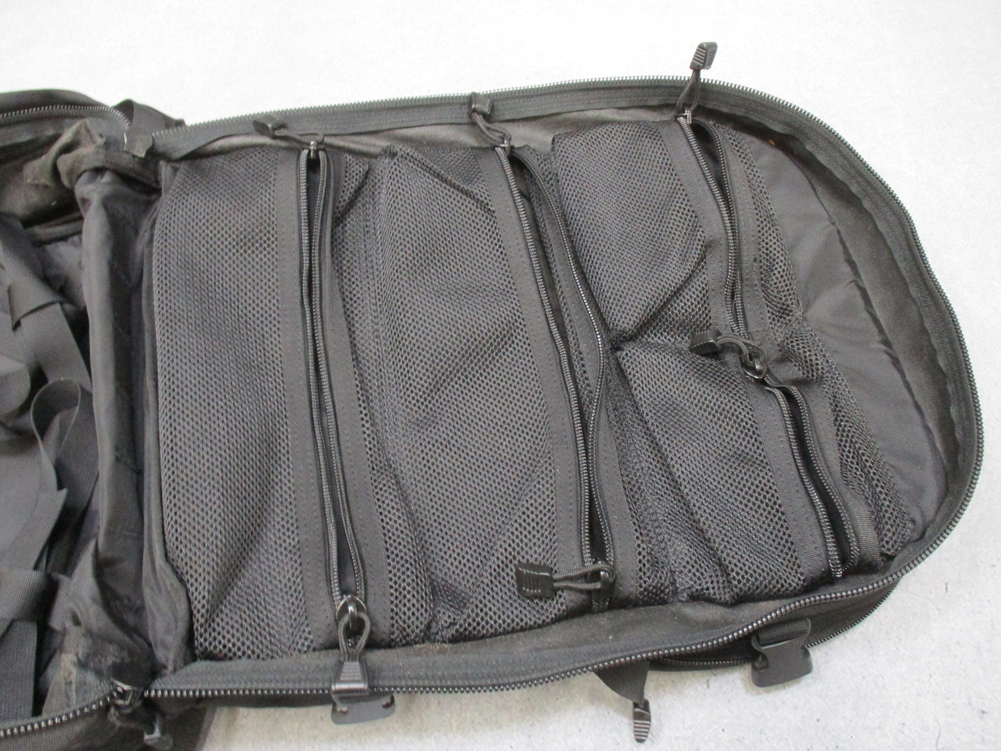 Blackhawk STRIKE medical backpack with MOLLE, black tactical medic aid bag by Centex Military Gear, featuring multiple compartments and straps.