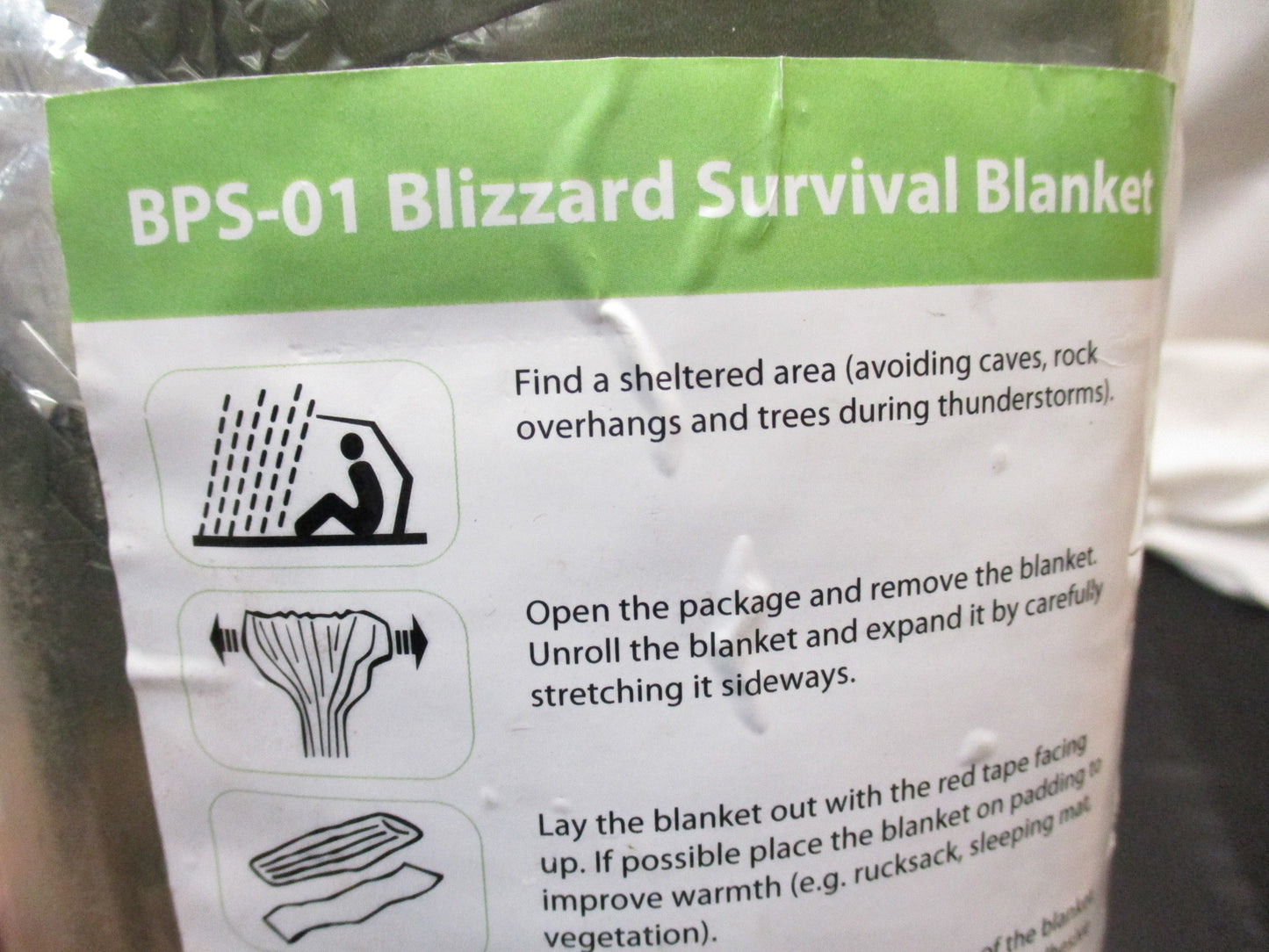 OD green NOS Blizzard Survival Blanket by Centex Military Gear, used for hiking, camping, rescue, and military outdoor activities.
