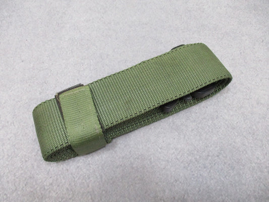 Heavy-duty US military stretcher strap with Cobra buckle for patient securing, made by Centex Military Gear, featuring durable stretch material.