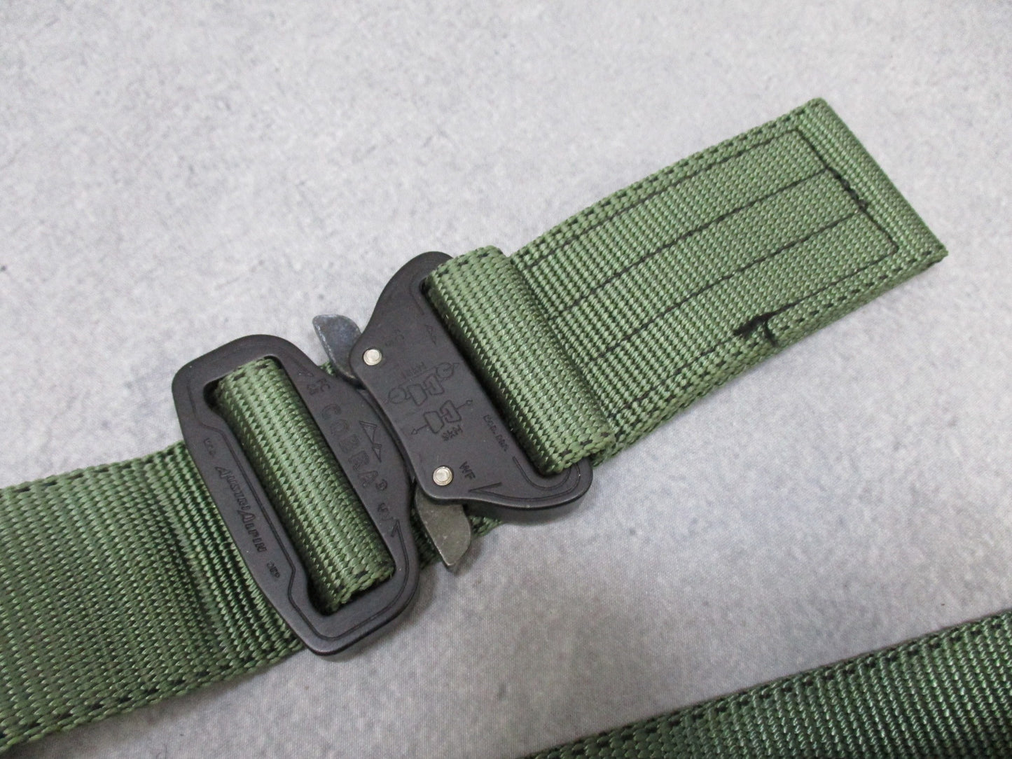 Heavy-duty US military stretcher strap with Cobra buckle by Centex Military Gear, designed for securing patients on stretchers.