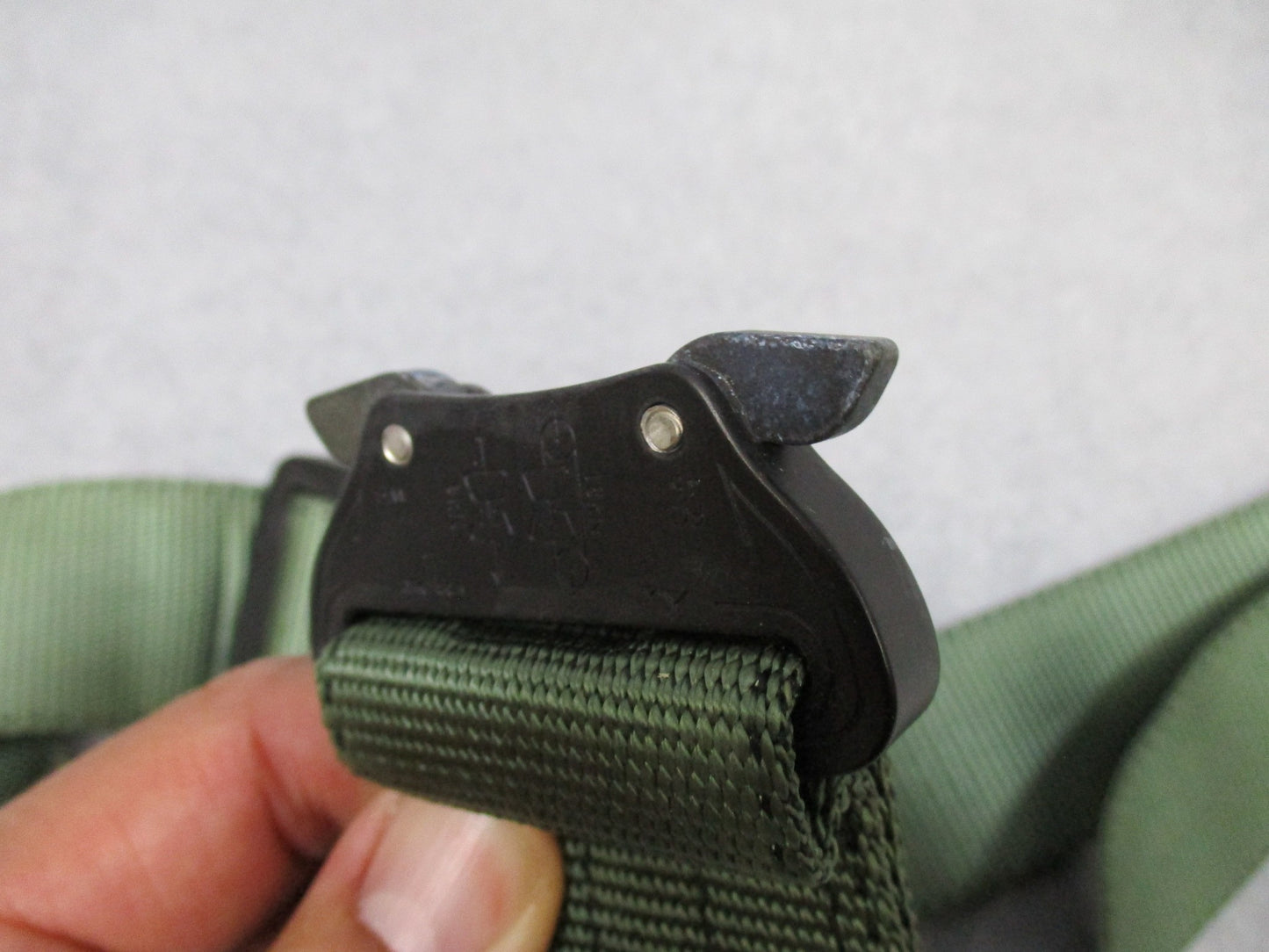 Heavy-duty US military stretcher strap with Cobra buckle for patient securing, featuring stretchable material, by Centex Military Gear.