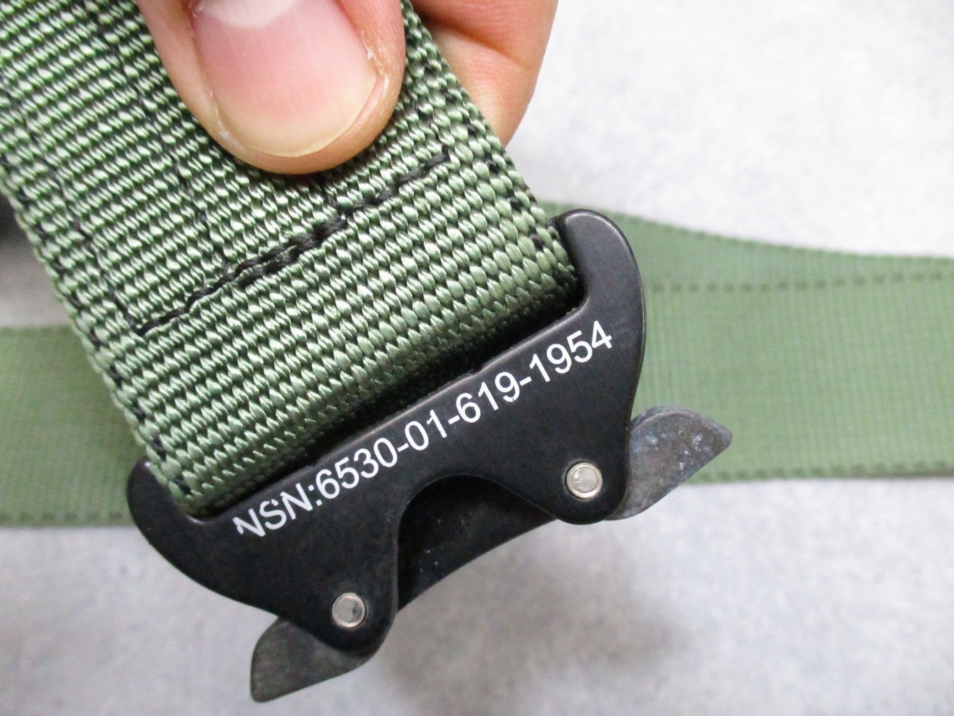 Heavy-duty US military stretcher strap with Cobra buckle from Centex Military Gear, designed for patient securing on stretchers.