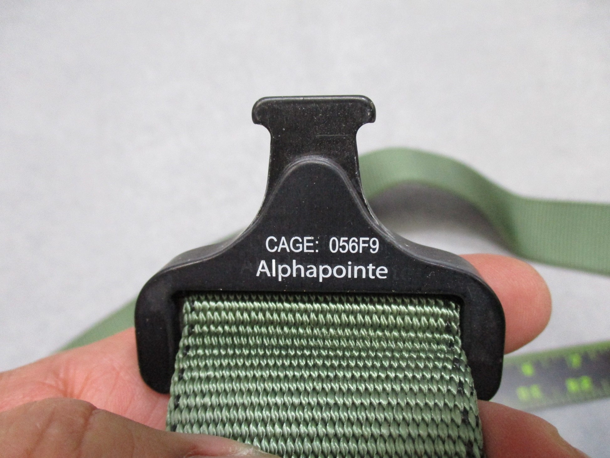 Heavy-duty US military stretcher strap with Cobra buckle by Centex Military Gear, used for securing patients on stretchers.