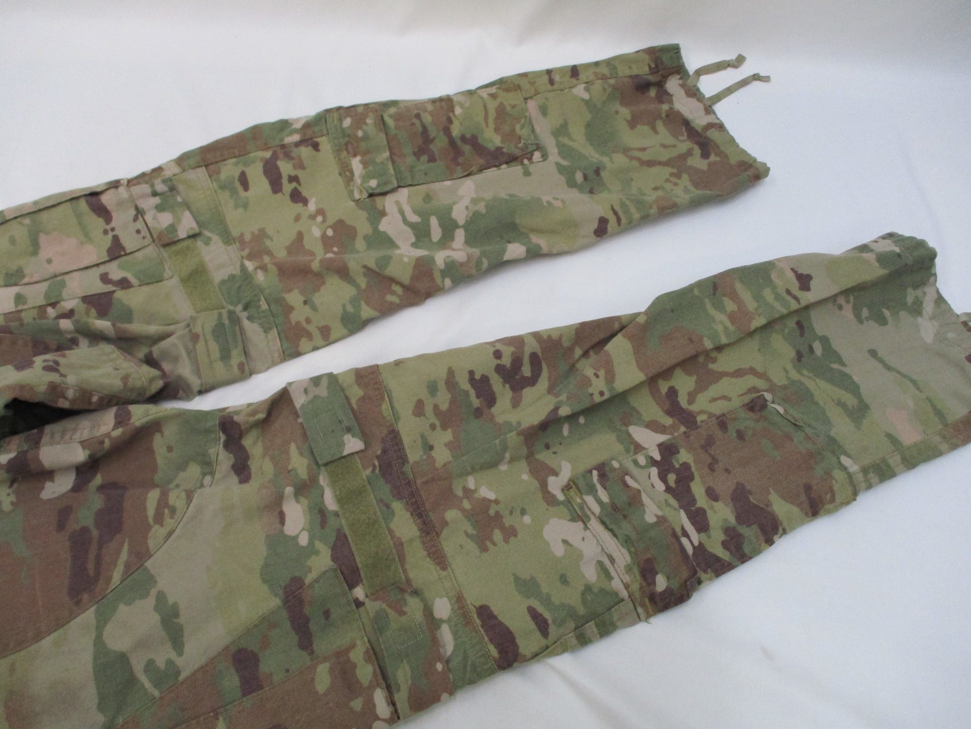 Used Army Advanced Combat Pants with knee pad slots in Scorpion OCP camouflage, size small/regular, by Centex Military Gear.
