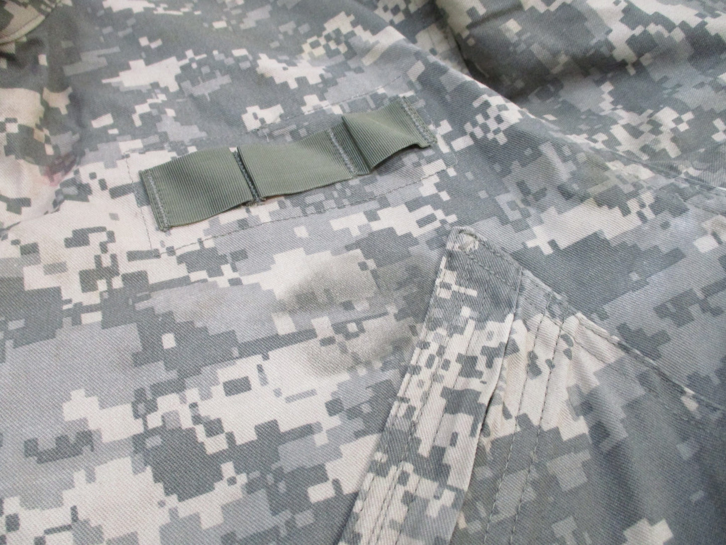 Used Centex Military Gear mechanic coveralls in UCP digital camo, size large, Type III army issue work suit with multiple pockets.