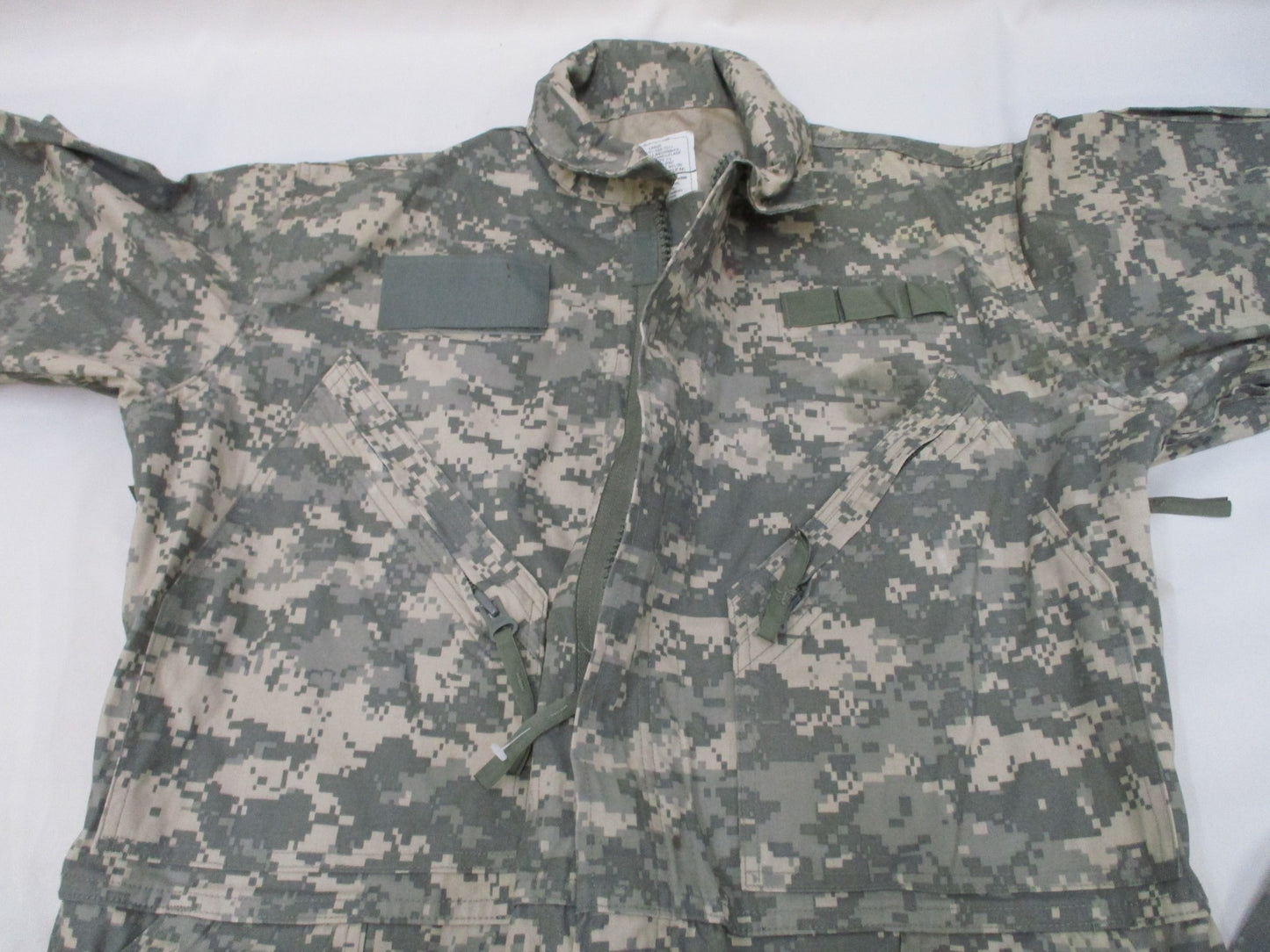 Used Centex Military Gear UCP Army mechanic coveralls, Type III large ACU digital camouflage, showing front view with multiple pockets.