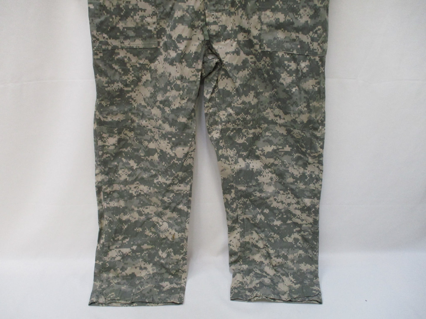 Used military army issue mechanic coveralls in UCP digital camo, type III, large size, from Centex Military Gear.
