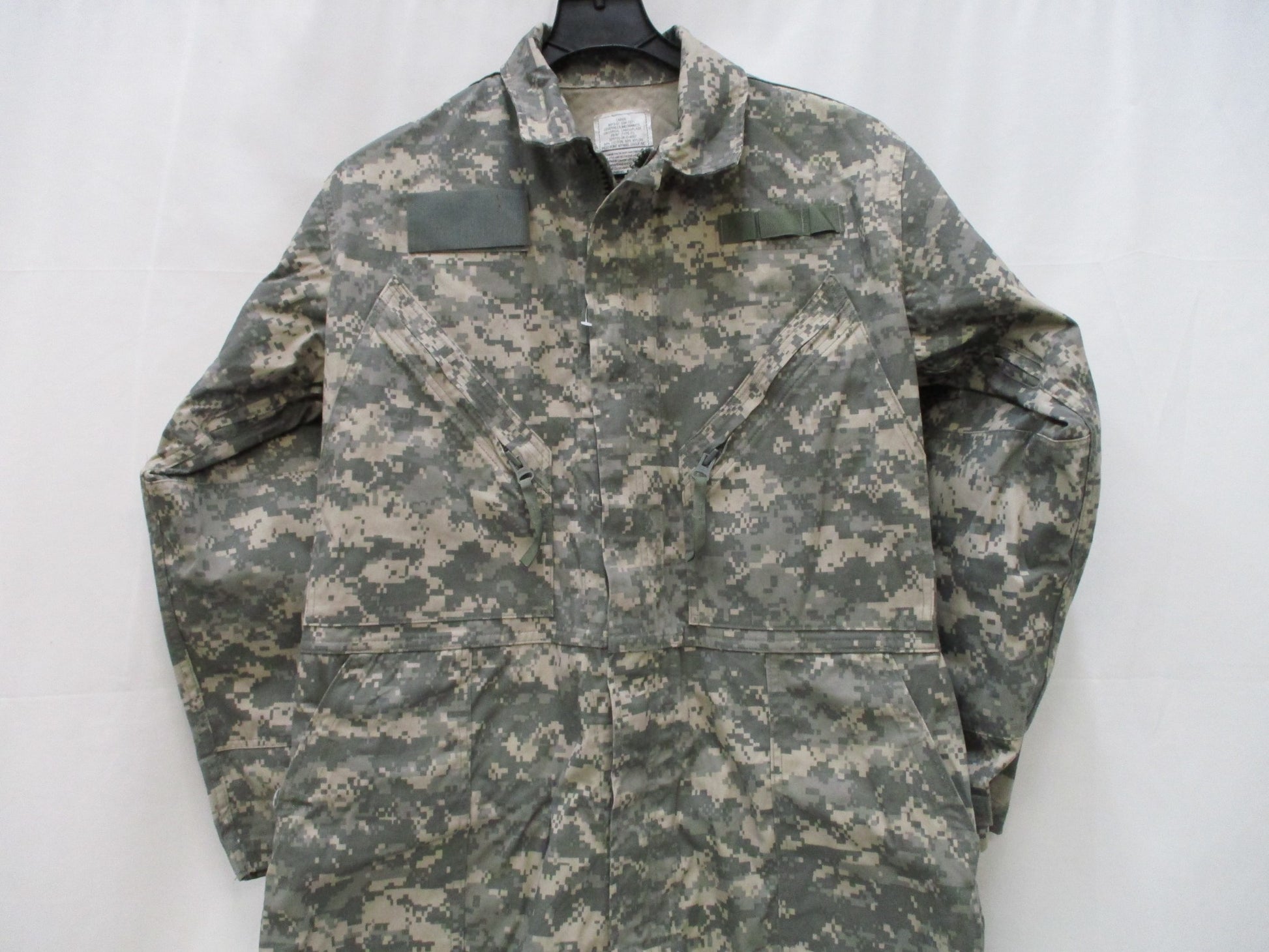 Used Centex Military Gear UCP Army mechanic coveralls, Type III large ACU digital camouflage, front view with pockets and zippers.