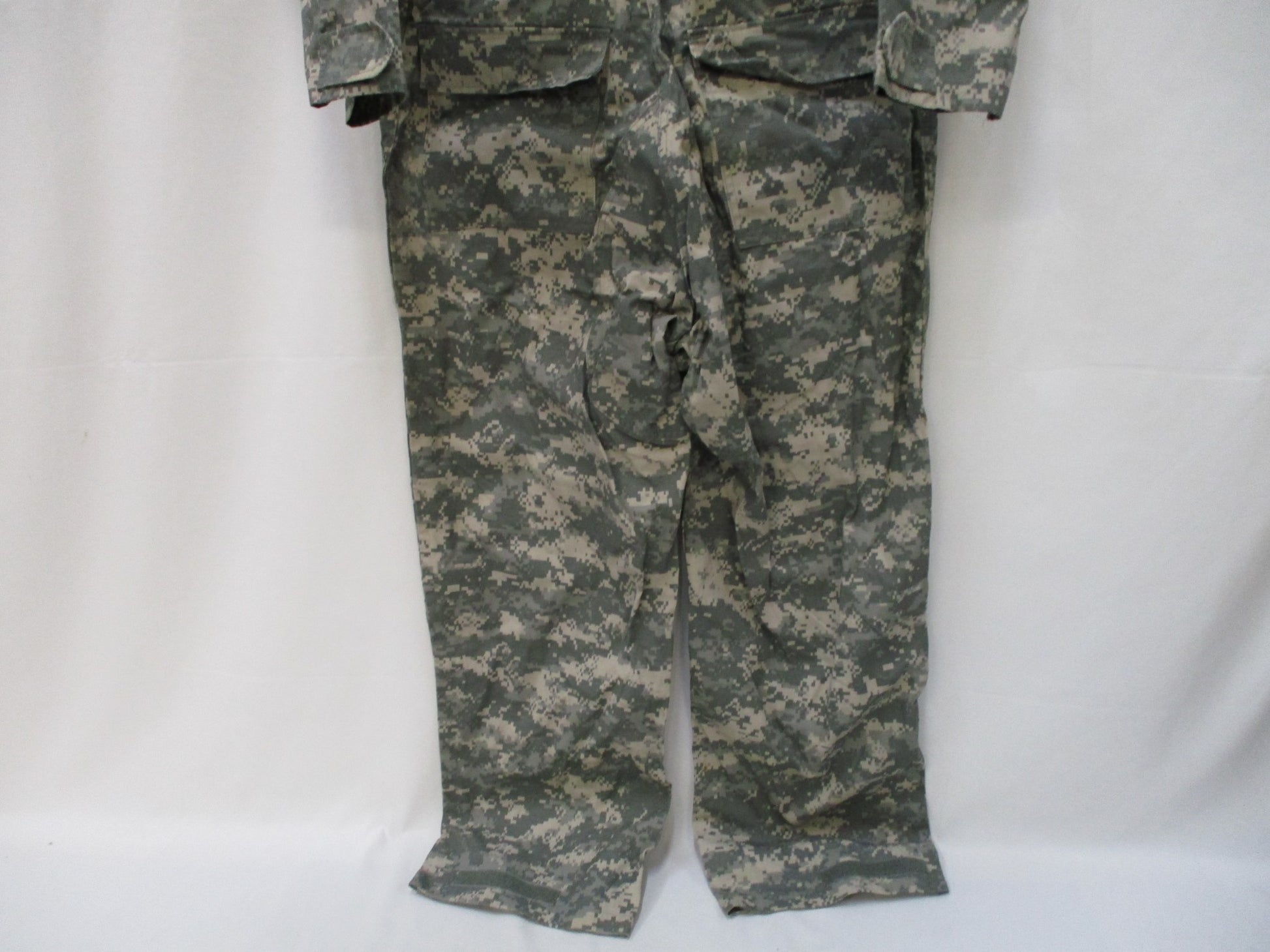 Used Centex Military Gear UCP Army mechanic coveralls, Type III, large ACU digital pattern, with multiple pockets and reinforced knees.
