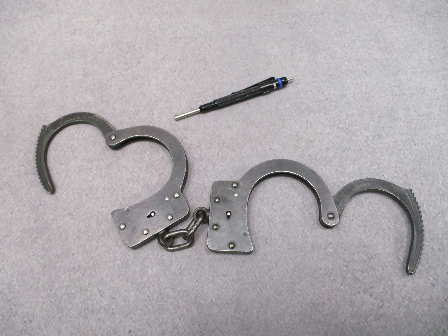 Vintage American Handcuff Co. Chain Link Handcuffs with ASP Key