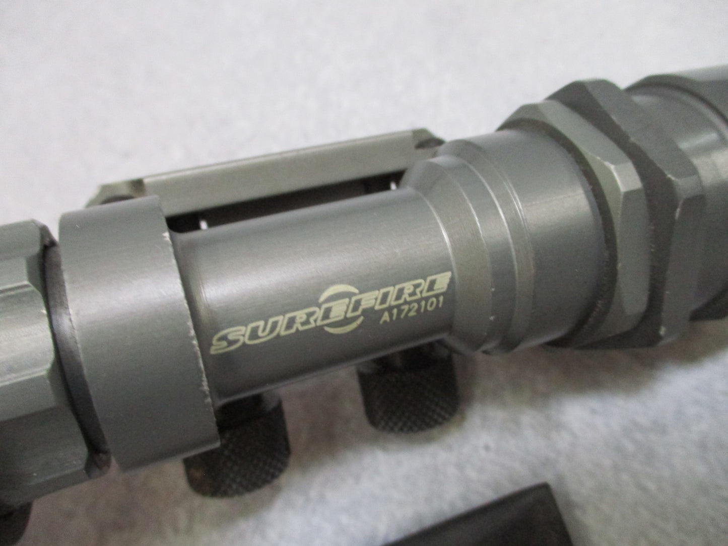 SUREFIRE MILLENNIUM UNIVERSAL WEAPONLIGHT RAIL MOUNT FLASHLIGHT M951 THUMB NUT