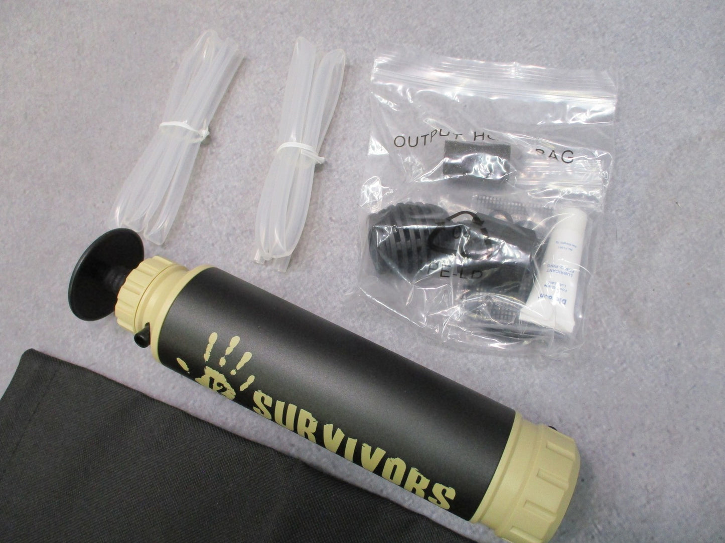 12 Survivors TS76003 Hand Pump Water Purifier - Portable Camping Survival Filter